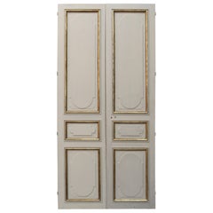 Porte doppie con pannelli antichi alti