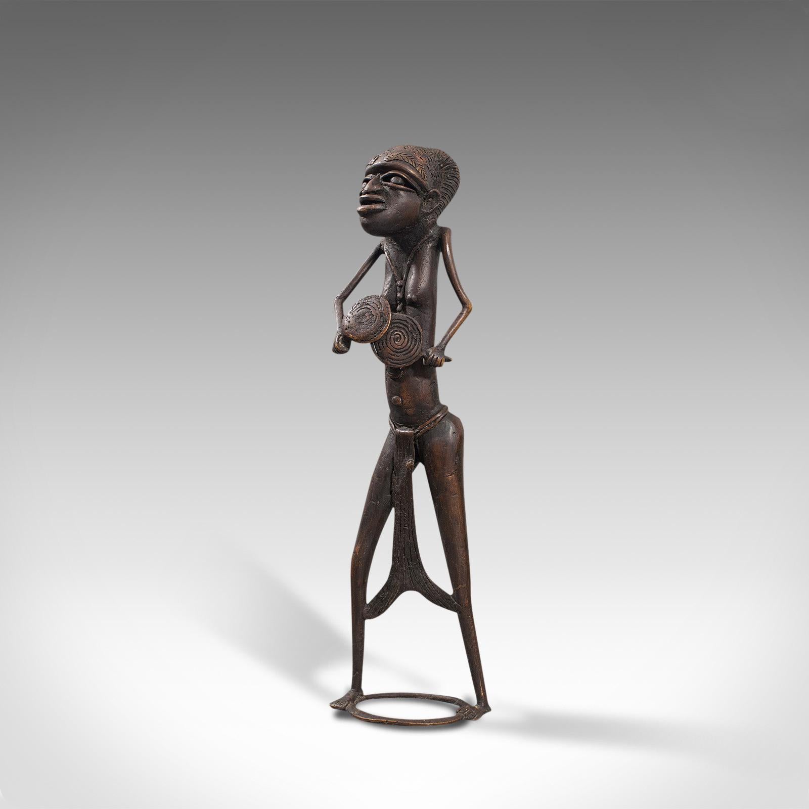 tall african woman statue