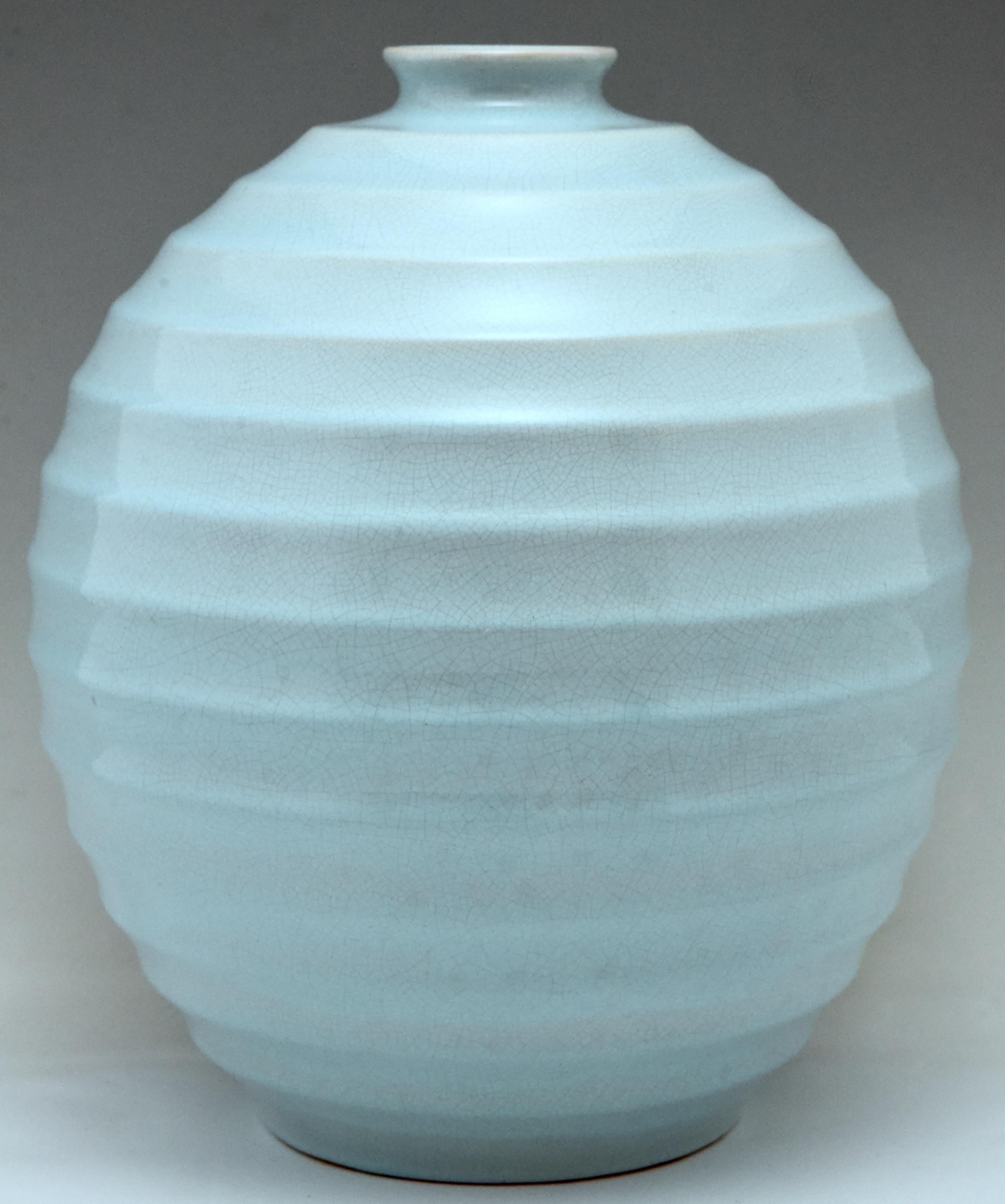Impressive Art Deco ceramic vase, glazed light blue ribbed spherical form, H. 14 inch.
By Villeroy & Boch, Luxembourg, circa 1930-1940.