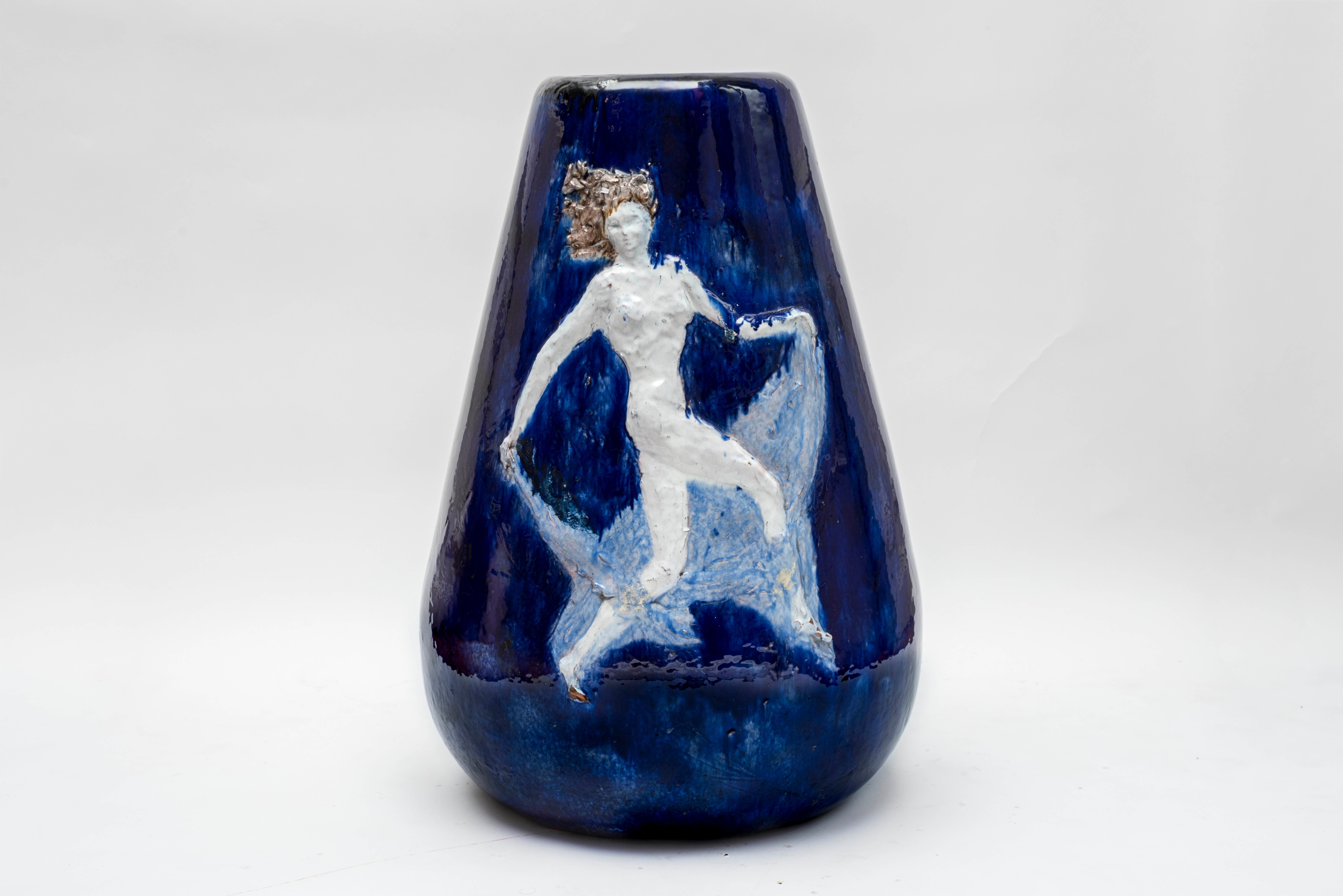1930s ceramic vase showing a dancer
Good vintage condition
Few small imperfection due to Heat in creation of large ceramic piece
Signed
France or Italy,
circa 1930.