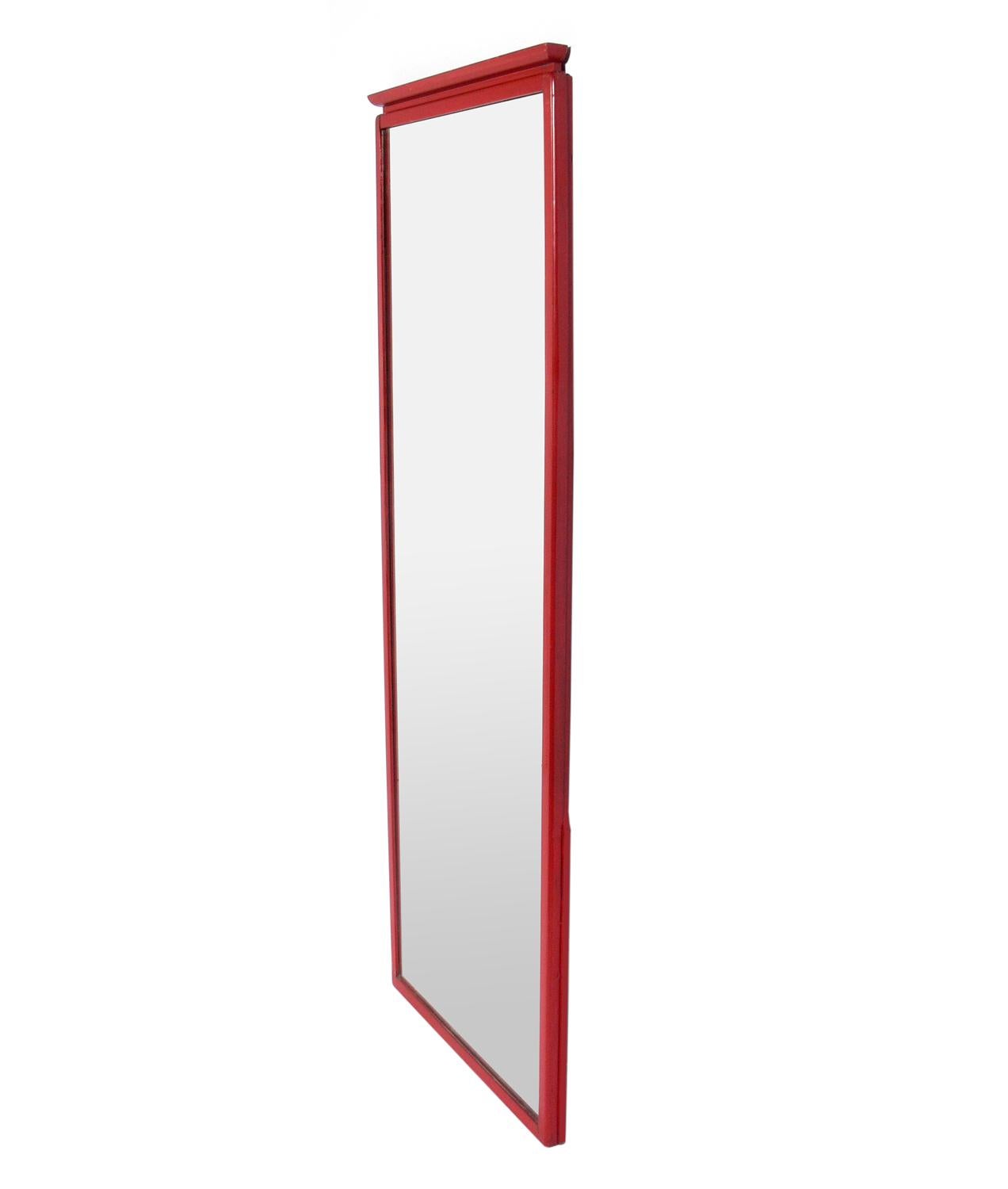 Tall Art Deco mirror with subtle Asian influences, designed by Donald Deskey for his own company, Amodec, circa 1930s. This piece is currently being refinished and can be completed in your choice of colors. The price noted includes refinishing in