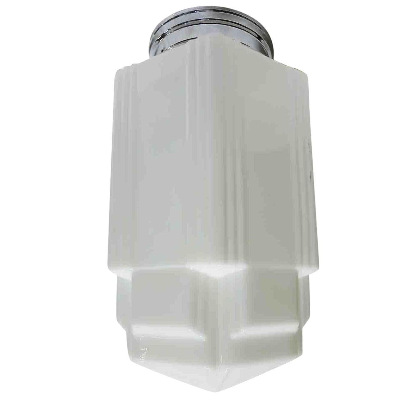 Unique Art Deco Stepped Skyscraper ceiling glass globe in white milk glass features distinctive skyscraper-style ribbed corners and a triple-tier design. Available with new Brass or Chrome 6
