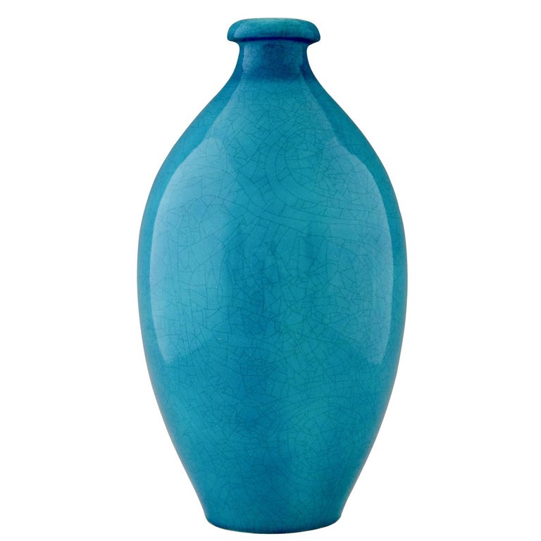 Impressive Art Deco vase in blue craquelé ceramic by Boch Freres, Belgium 1924. Shape number 961. Measures: H. 20.3 inch
Literature:
Similar vases are shown in the book?“Art Deco Ceramics, Charles Catteau” by Marc Pairon.?“Catteau” donation Claire