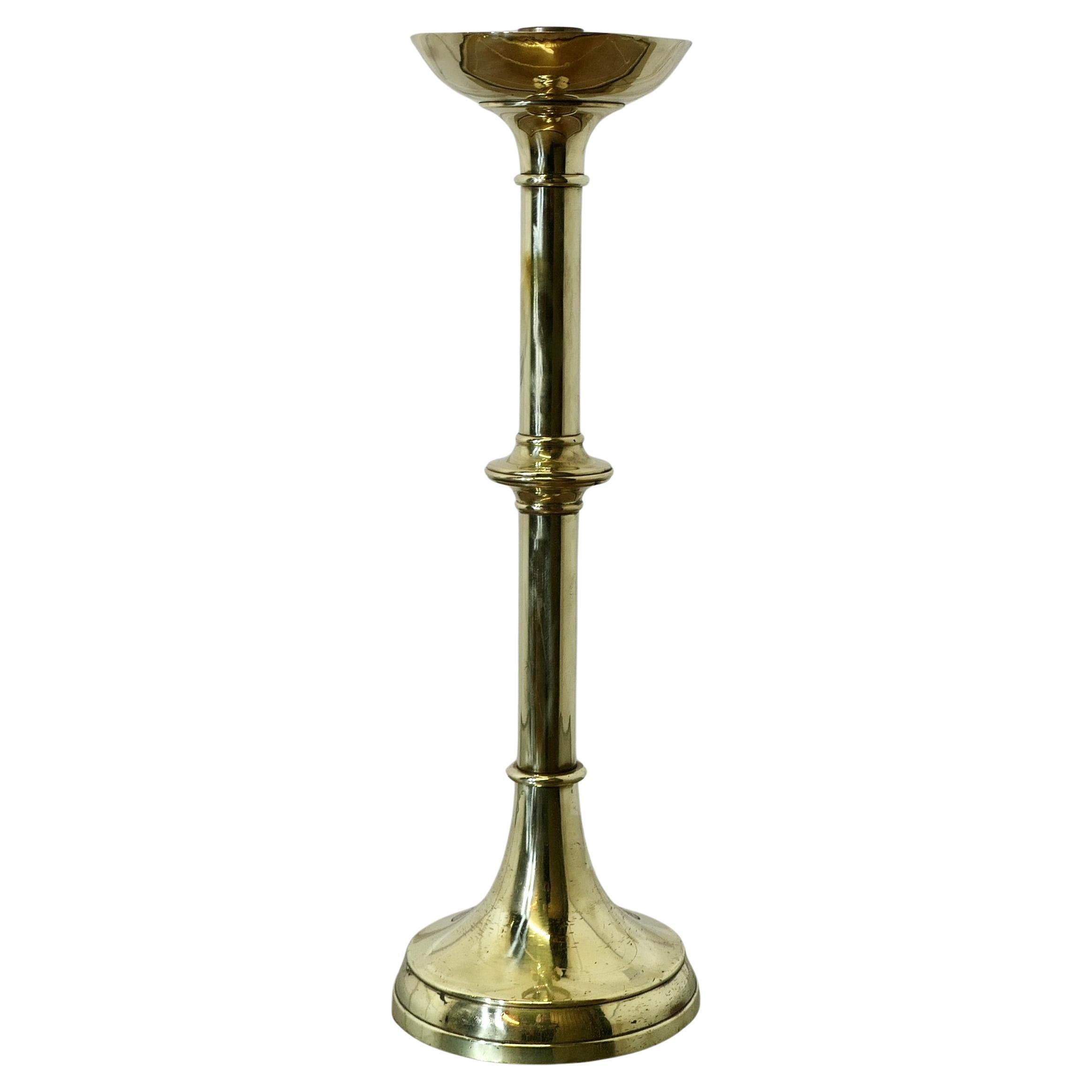 How can you tell if a candle holder is antique brass?