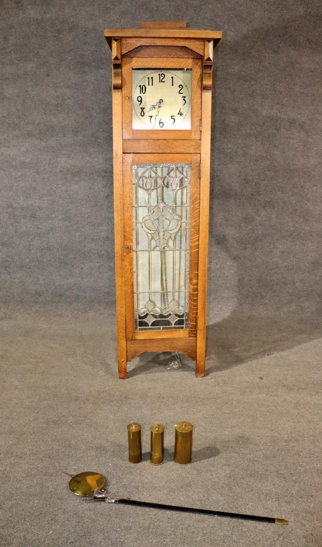 Germany. 173768. Oak frame. Stained glass panel doors. With weights and pendulum. 78 5/8