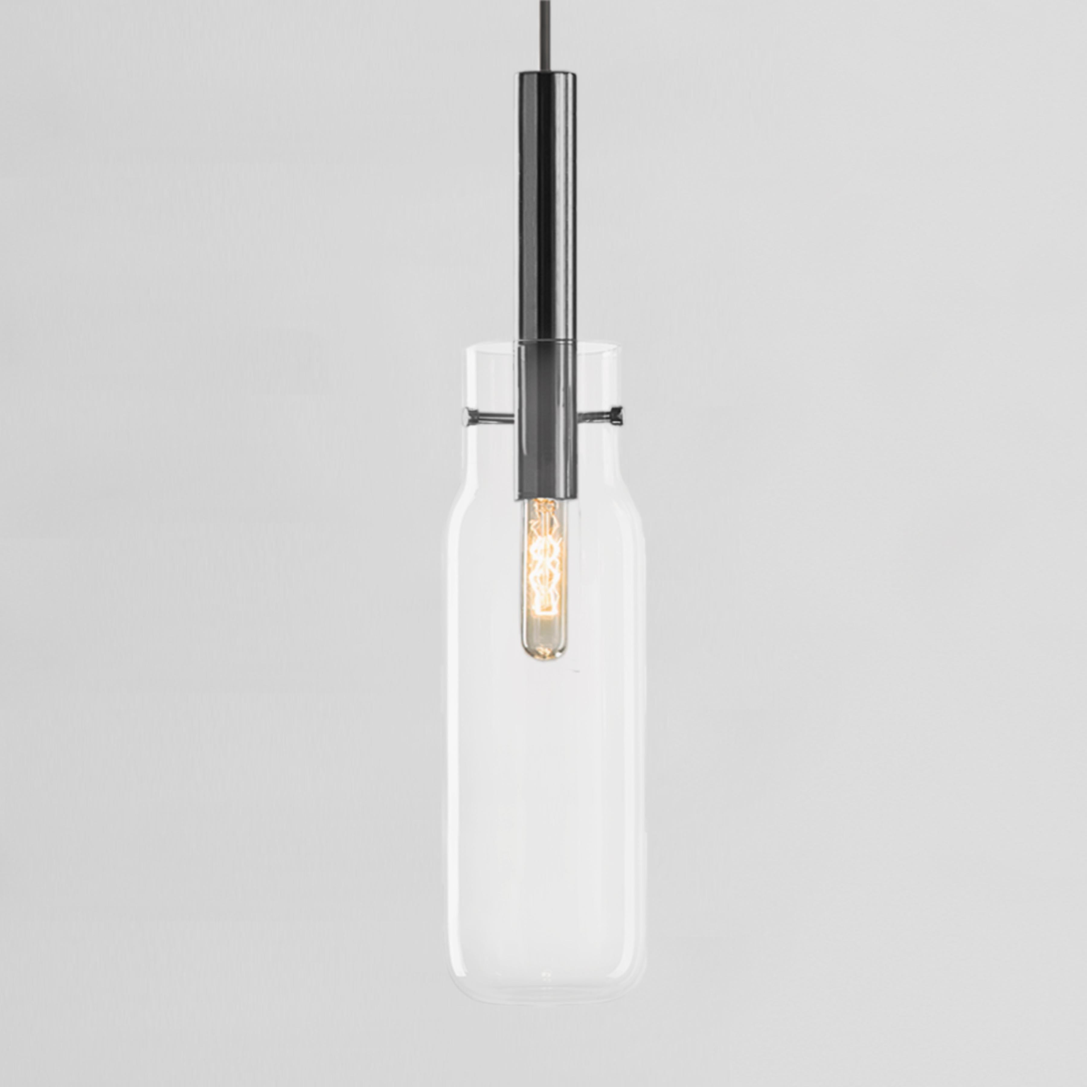 Tall Bandaska pendant light by Dechem Studio
Dimensions: D 9 x H 180 cm
Materials: Brass, glass.
Also available: Different colours and sizes available.

hand blown into beechwood moulds, Bandaska Lights is based on the highly popular Bandaska