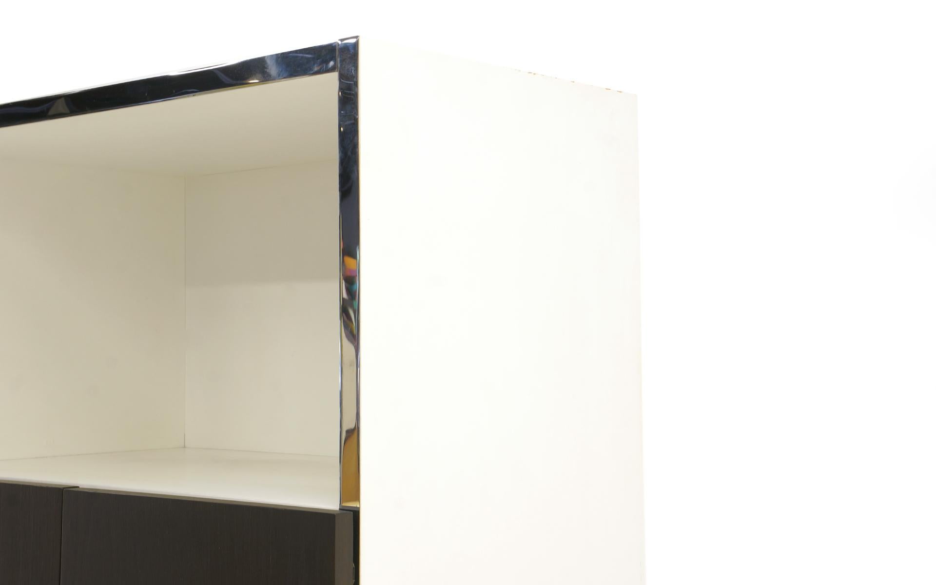 Late 20th Century Tall Bar / Storage Cabinet by Milo Baughman.  White,  Chrome Trim, Ebony Doors.
