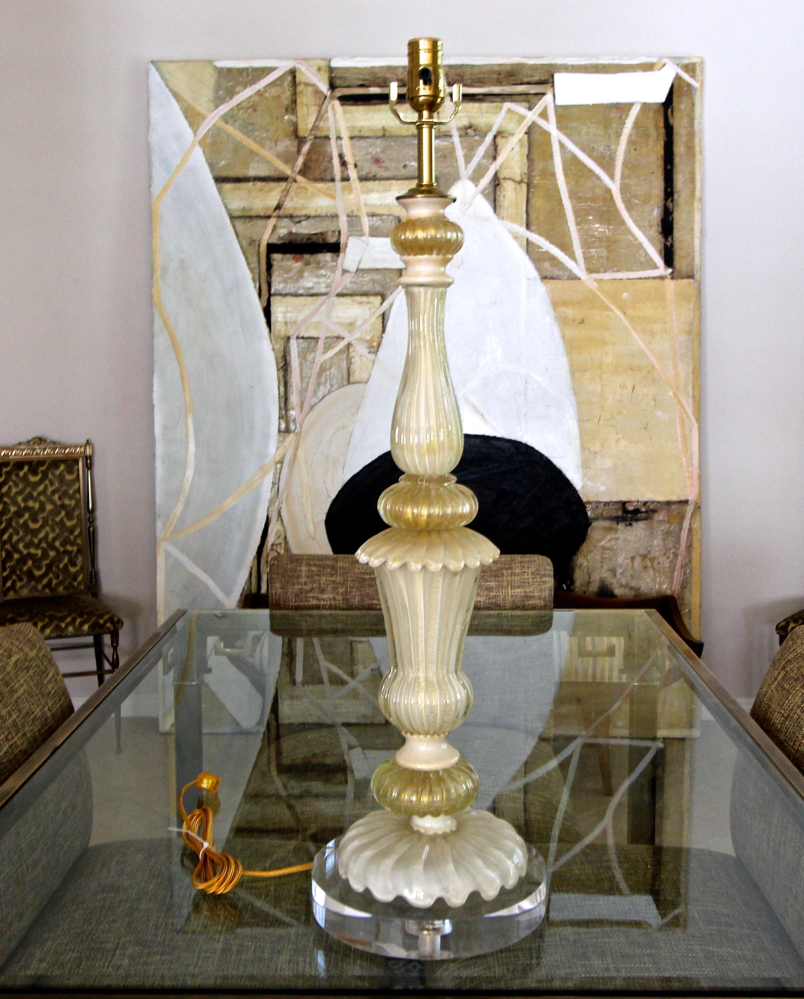 cream and gold lamps