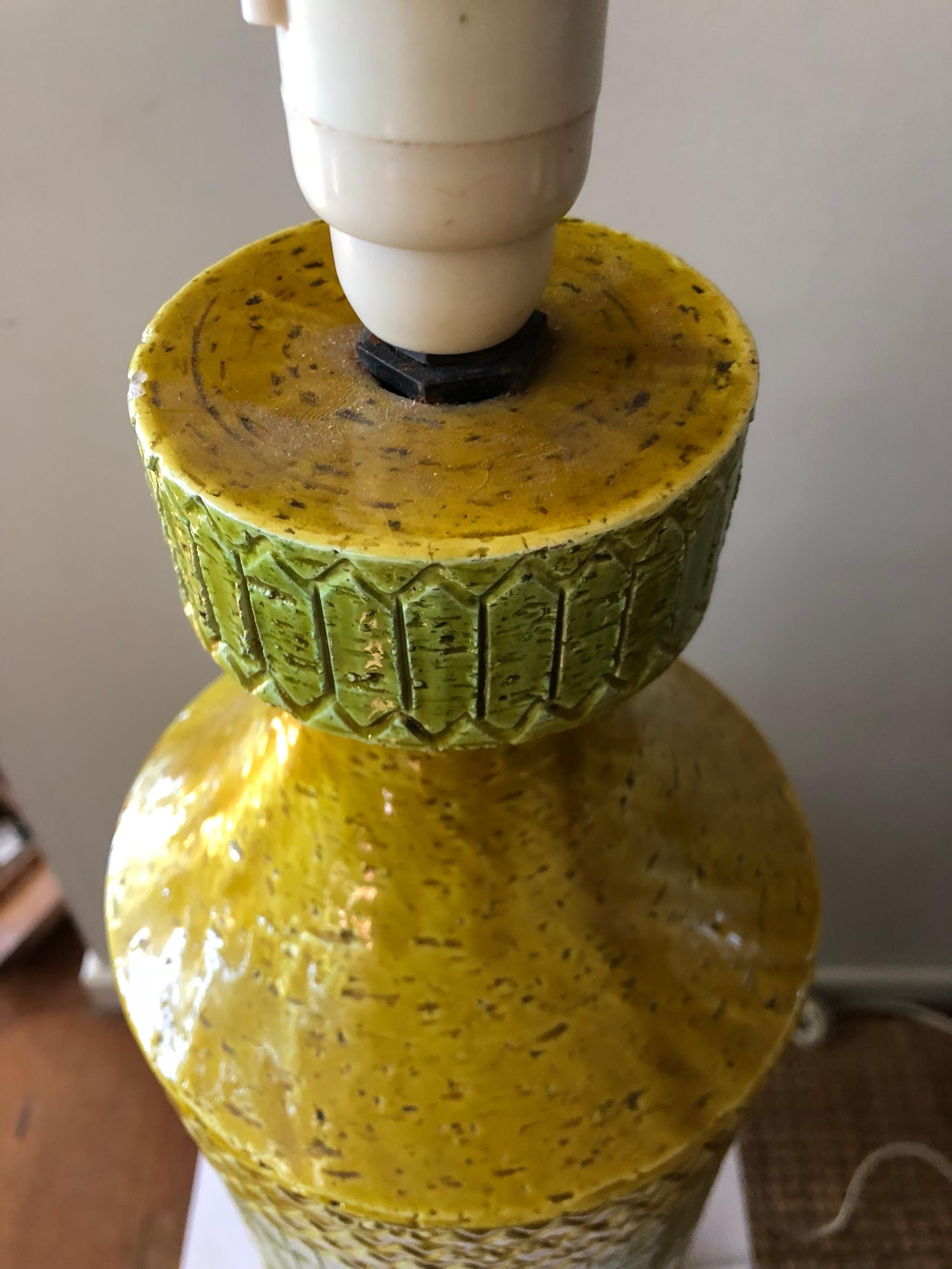 Mid-20th century modern tall Italian Bitossi Aldo Londi art pottery lamp. 
Textured pottery with luster finish 
Signed base,
circa 1960s.