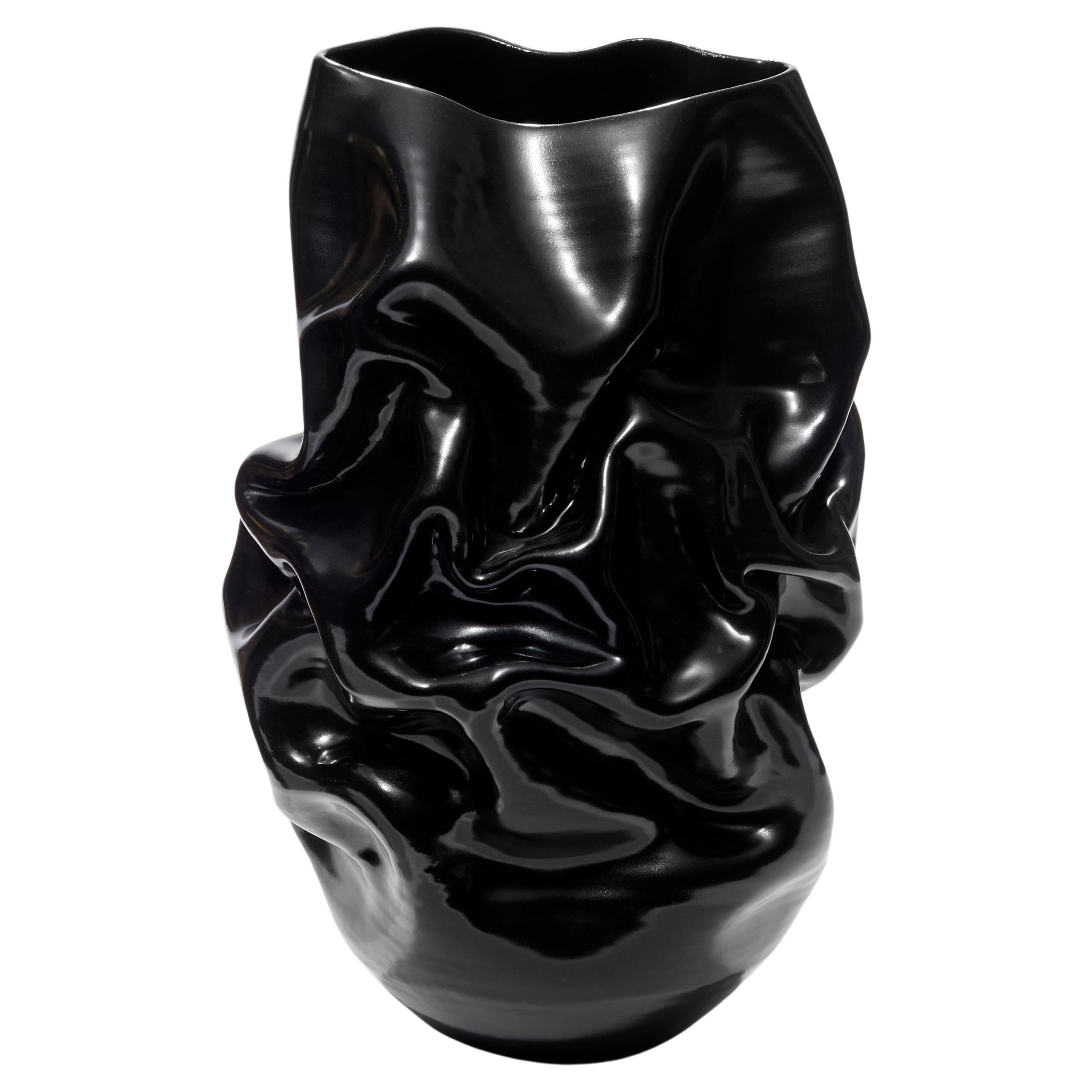 Tall Black Crumpled Form No 94, a Ceramic Vessel by Nicholas Arroyave-Portela