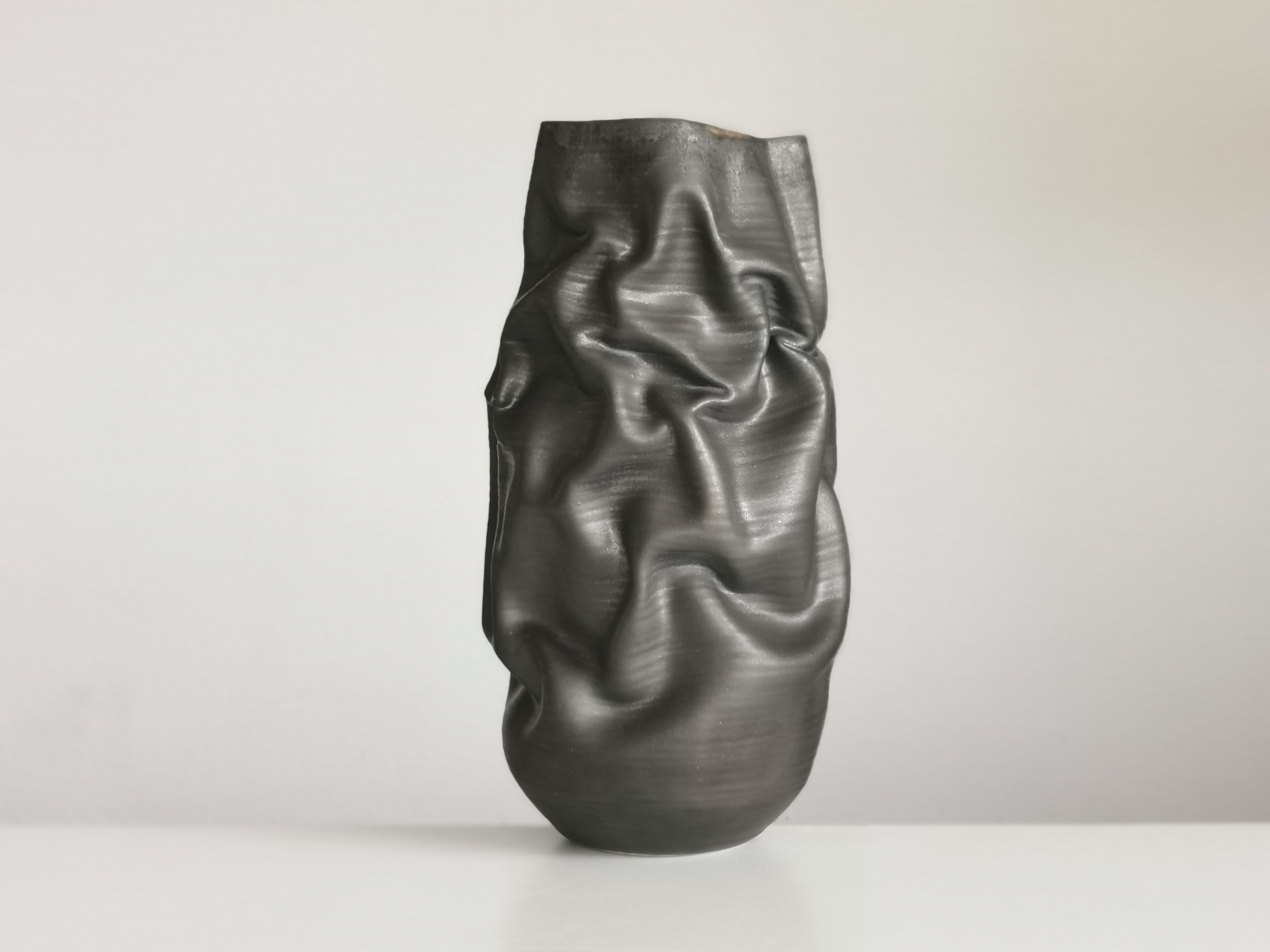 New sumptuous ceramic vessel from ceramic artist Nicholas Arroyave-Portela. Made in 2021.

Materials. White St. Thomas clay. Stoneware glazes. Multi fired to cone 9 (1260-1280 degrees)

Measures H 45 cm x W 20 cm x D 20 cm

The artist starts