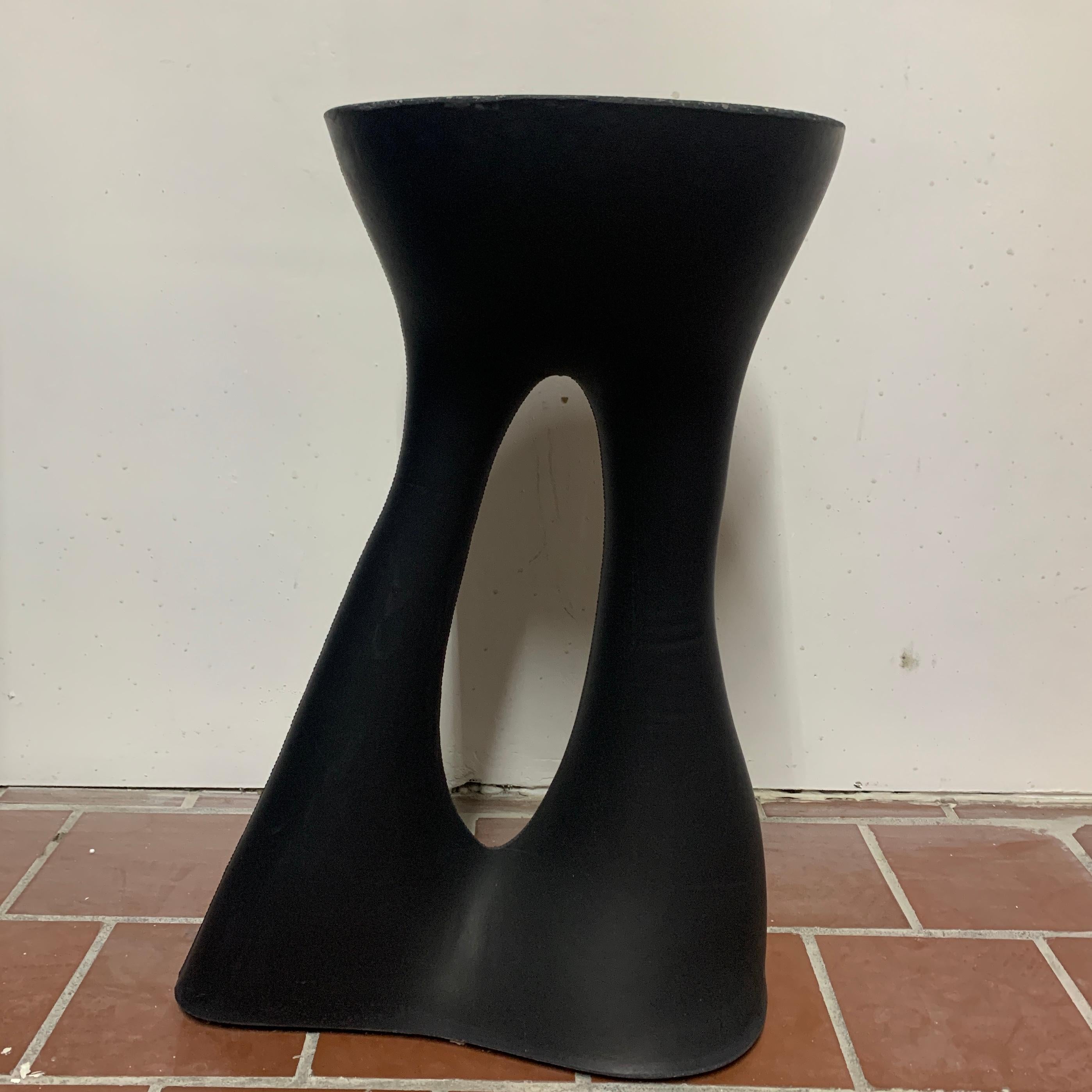 This piece has some small chipping on the top edge, but is otherwise in great condition. See the images for details.

Industrial, organic and sculptural, the Kreten side tables are concrete furniture like you haven’t seen before. Original pieces