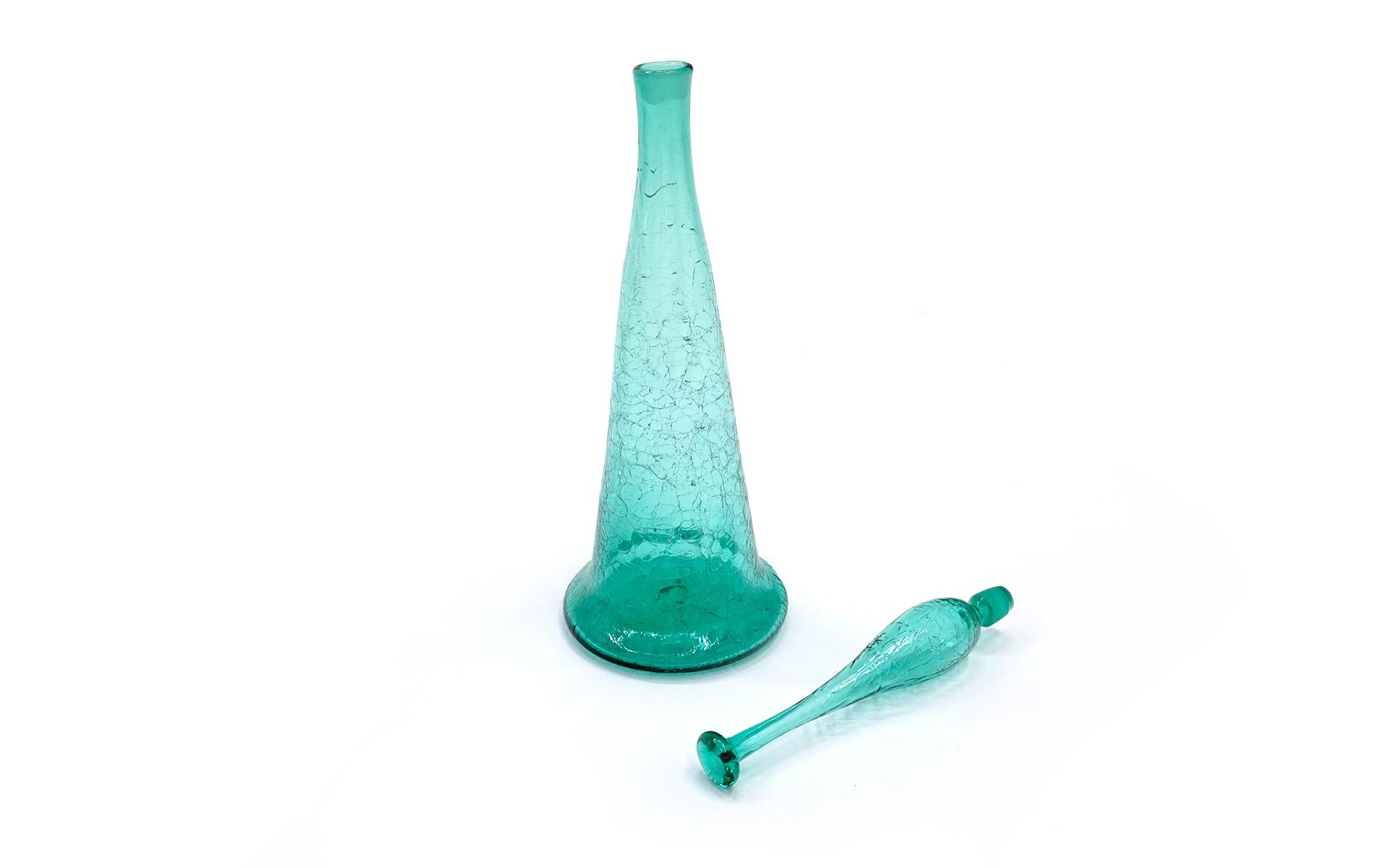 Vintage blown crackle glass green Blenko bottle with the original stopper. 27 1/2 inches tall. Perfect condition.