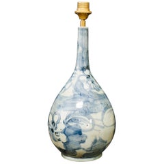 Two Tall Blue and White Lamps