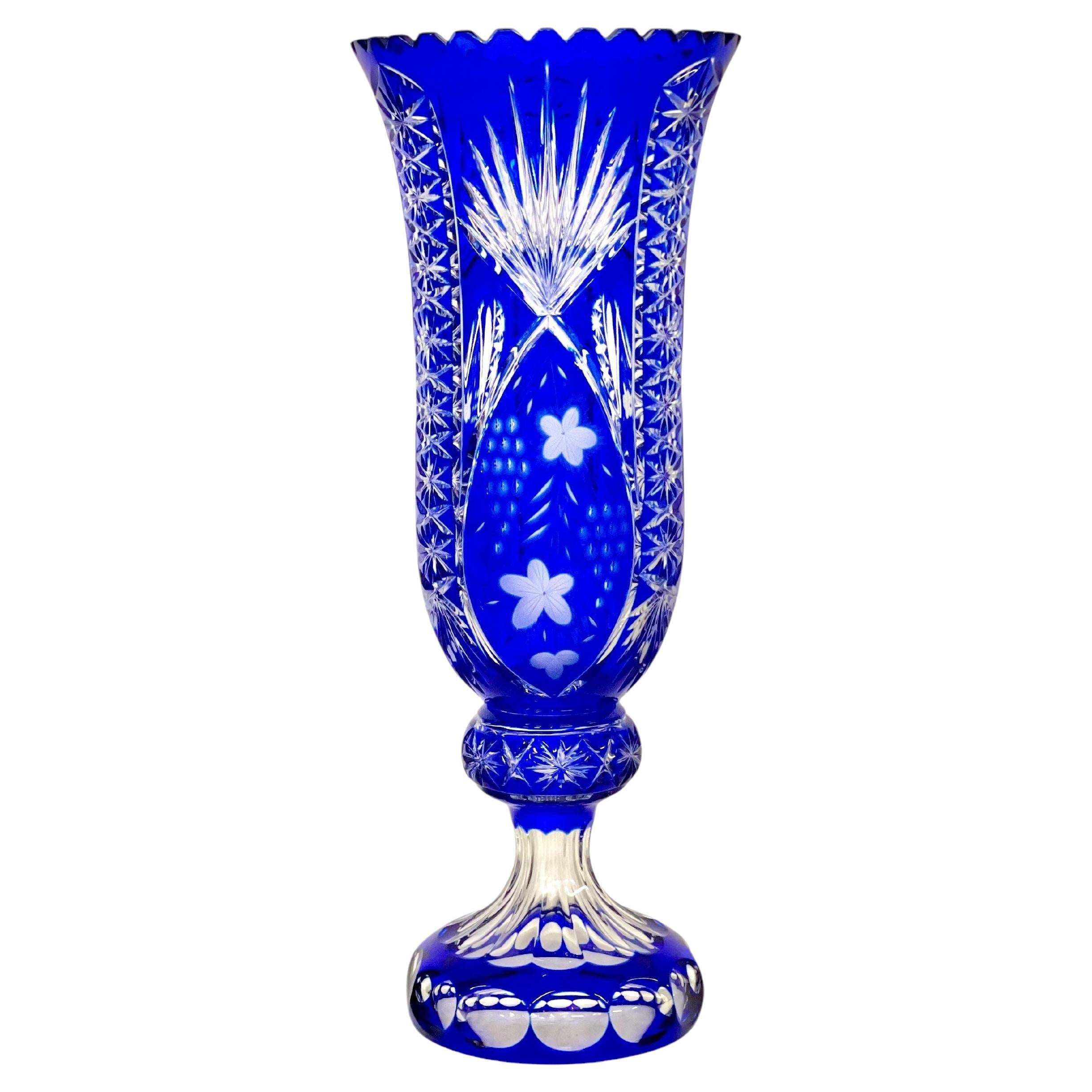Tall Blue Overlay Crystal Vase with Floral and Starburst Cut Decoration