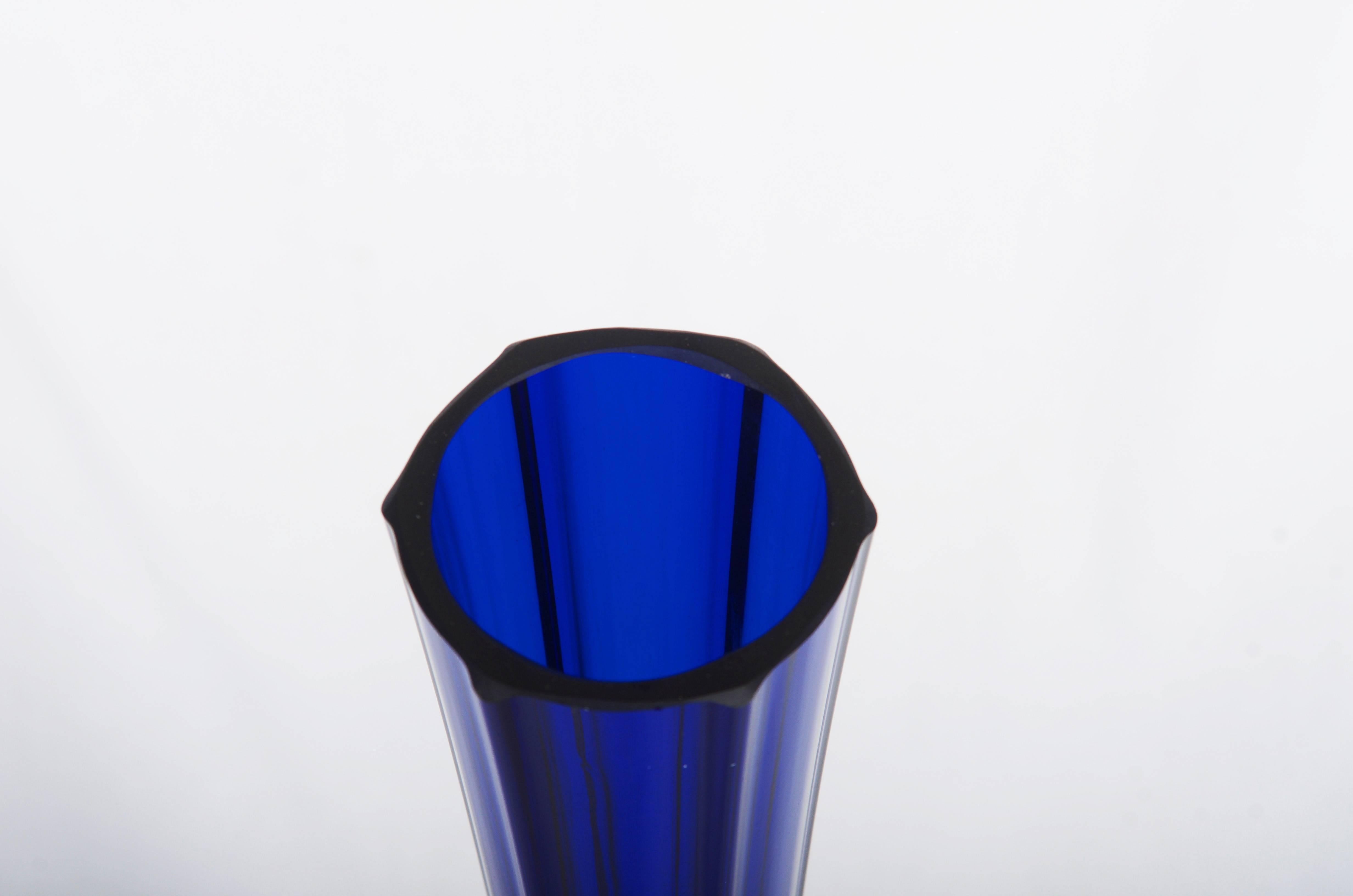 Handblown blue glass in a form of a flute. Made in a one of the Bohemian Glasswork in the late 1970s.