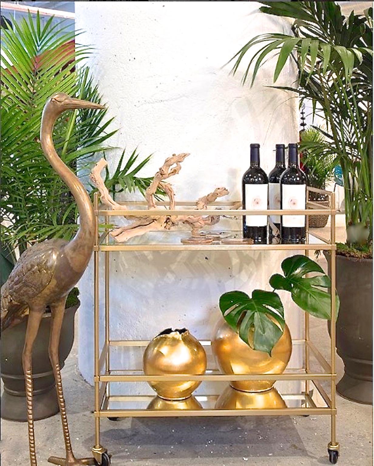 brass heron statues