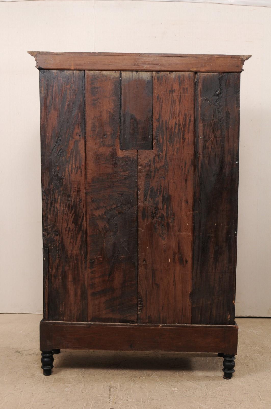 Tall British Colonial Carved Wood Storage Cabinet from the Mid-20th Century 4