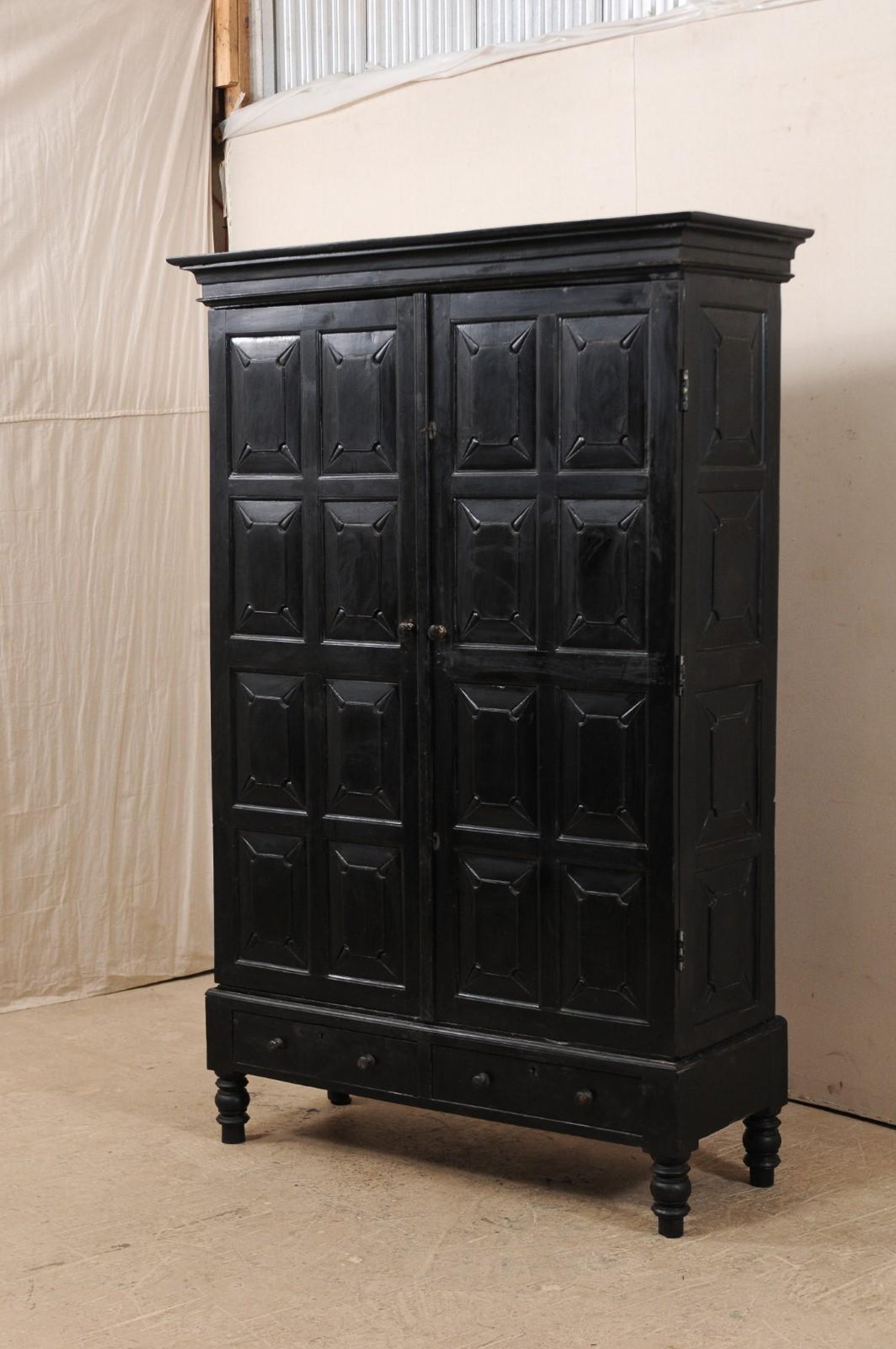 Tall British Colonial Carved Wood Storage Cabinet From The Mid