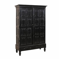 Vintage Tall British Colonial Carved Wood Storage Cabinet from the Mid-20th Century
