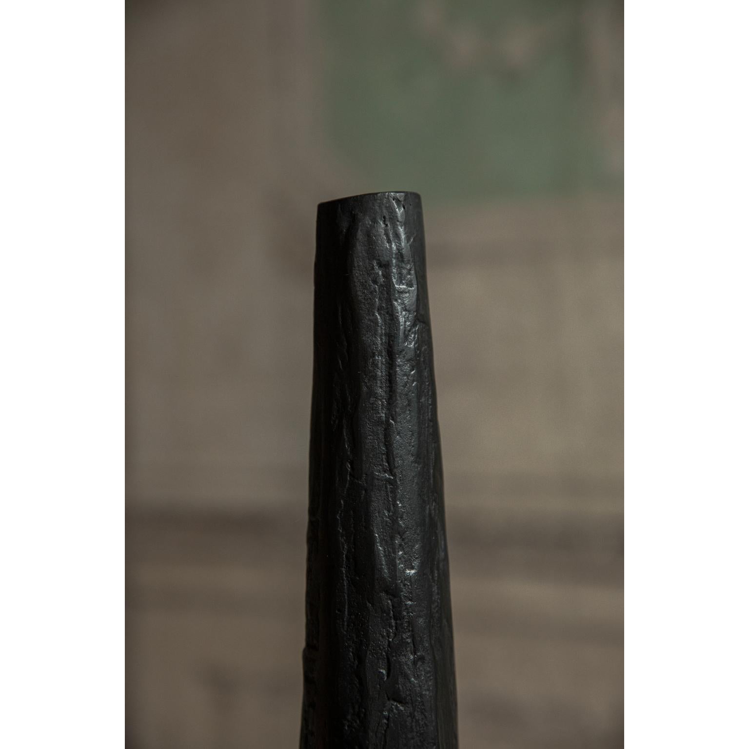 Tall bronze candle pillar by Rick Owens
2015
Dimensions: L 7.5 x W 7.5 x H 35 cm
Materials: Bronze
Weight: 2.8 kg

Rick Owens is a California-born fashion and furniture has developed a unique style that he describes as “luxe