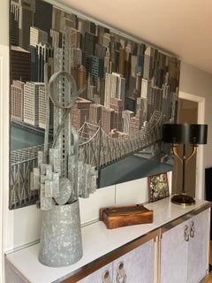 Tall brutalist metal sculpture