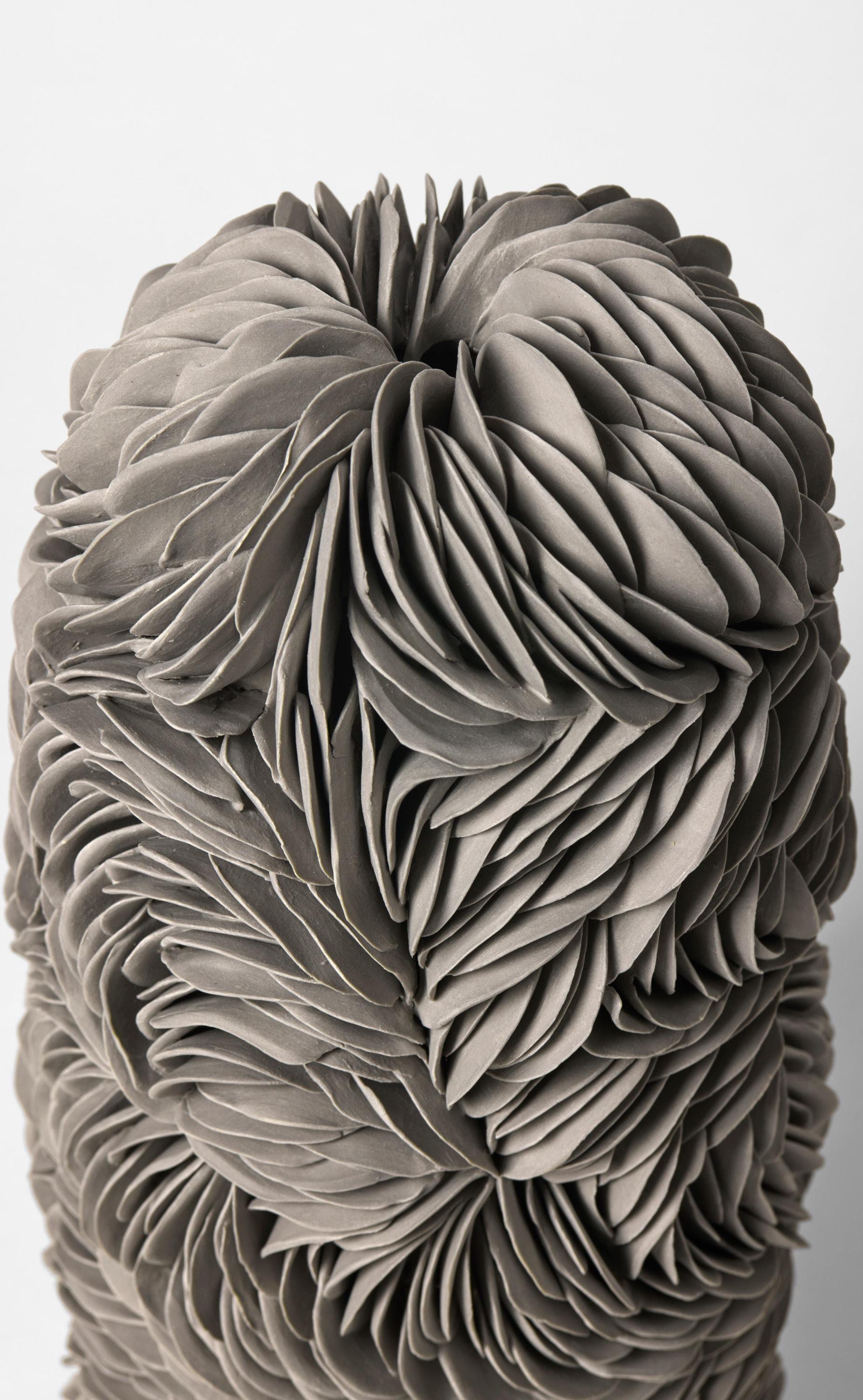 Fatto a mano Tall Budding Vessel in Grey, a textured porcelain sculpture by Olivia Walker in vendita