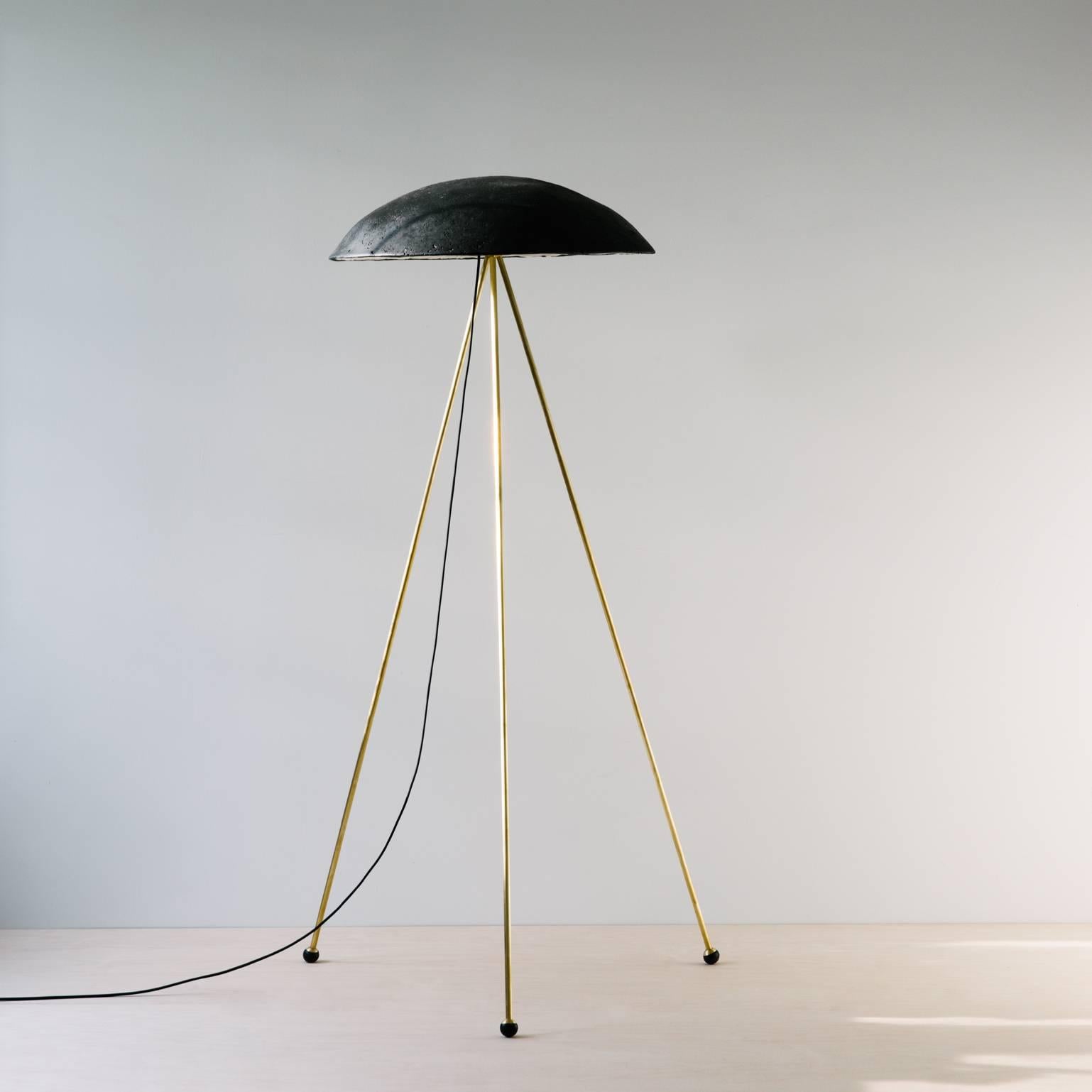 The Tall Buddy Floor Lamp is more staid than the funny buddy with an unmoving 