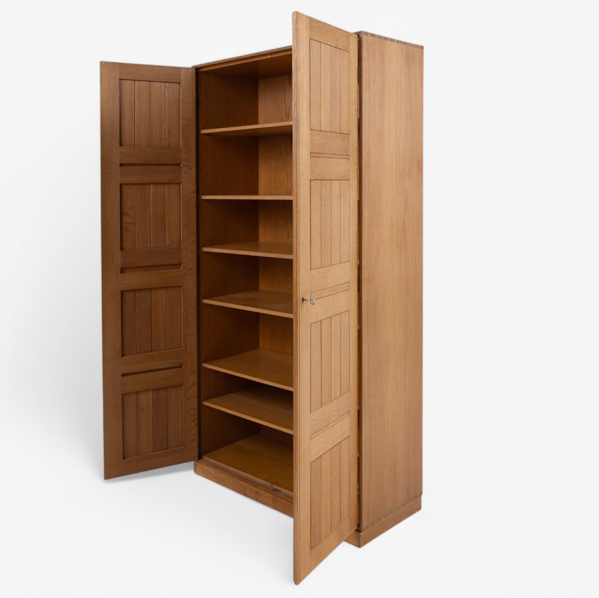 20th Century Tall cabinet in oak by Mogens Koch For Sale