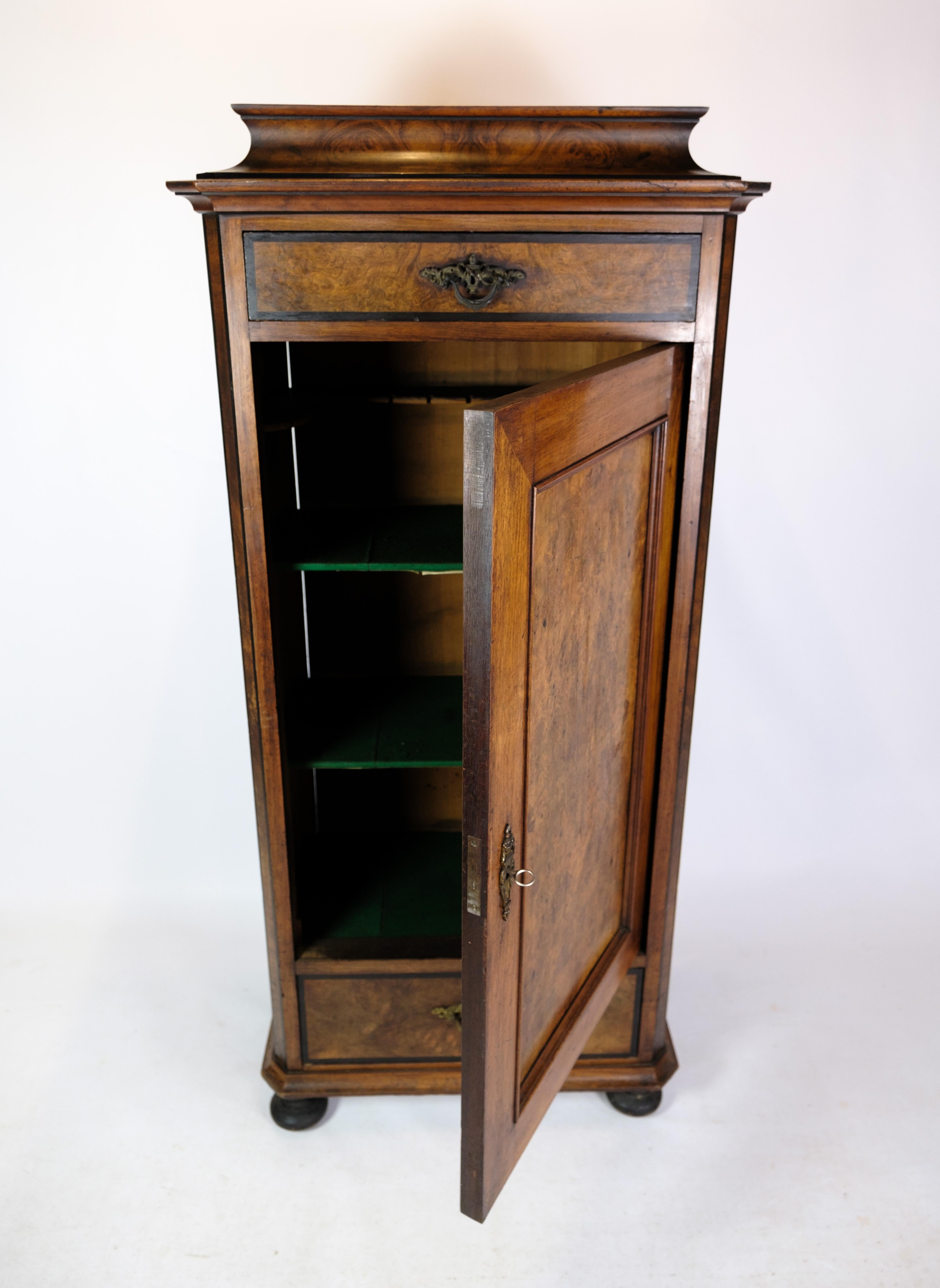 Tall cabinet of walnut, in great antique condition from the 1850s.
H - 155 cm, W - 65 cm and D - 39 cm.