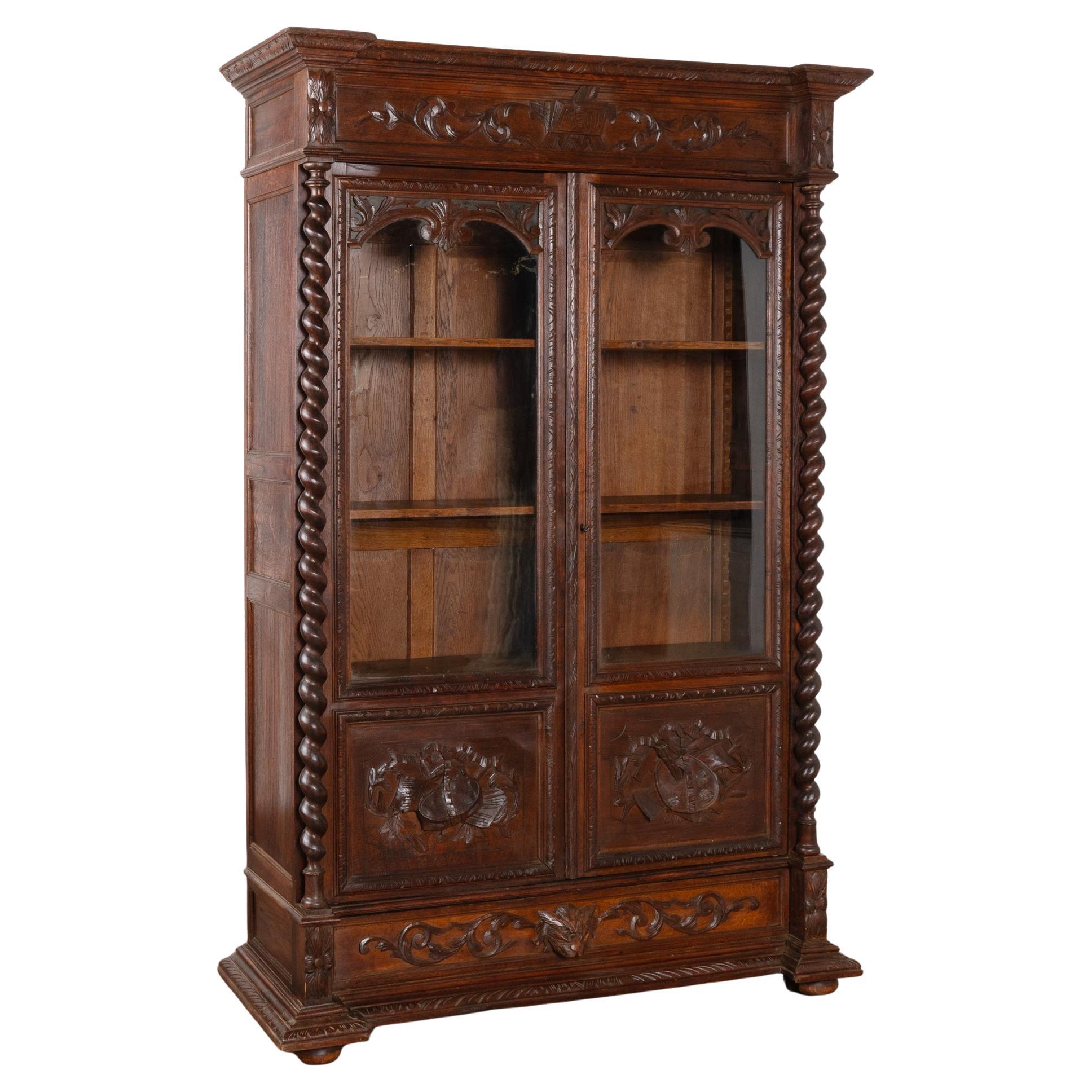 Vitrina librería alta de roble tallado, Alemania circa 1880-1890