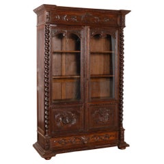 Vitrina librería alta de roble tallado, Alemania circa 1880-1890