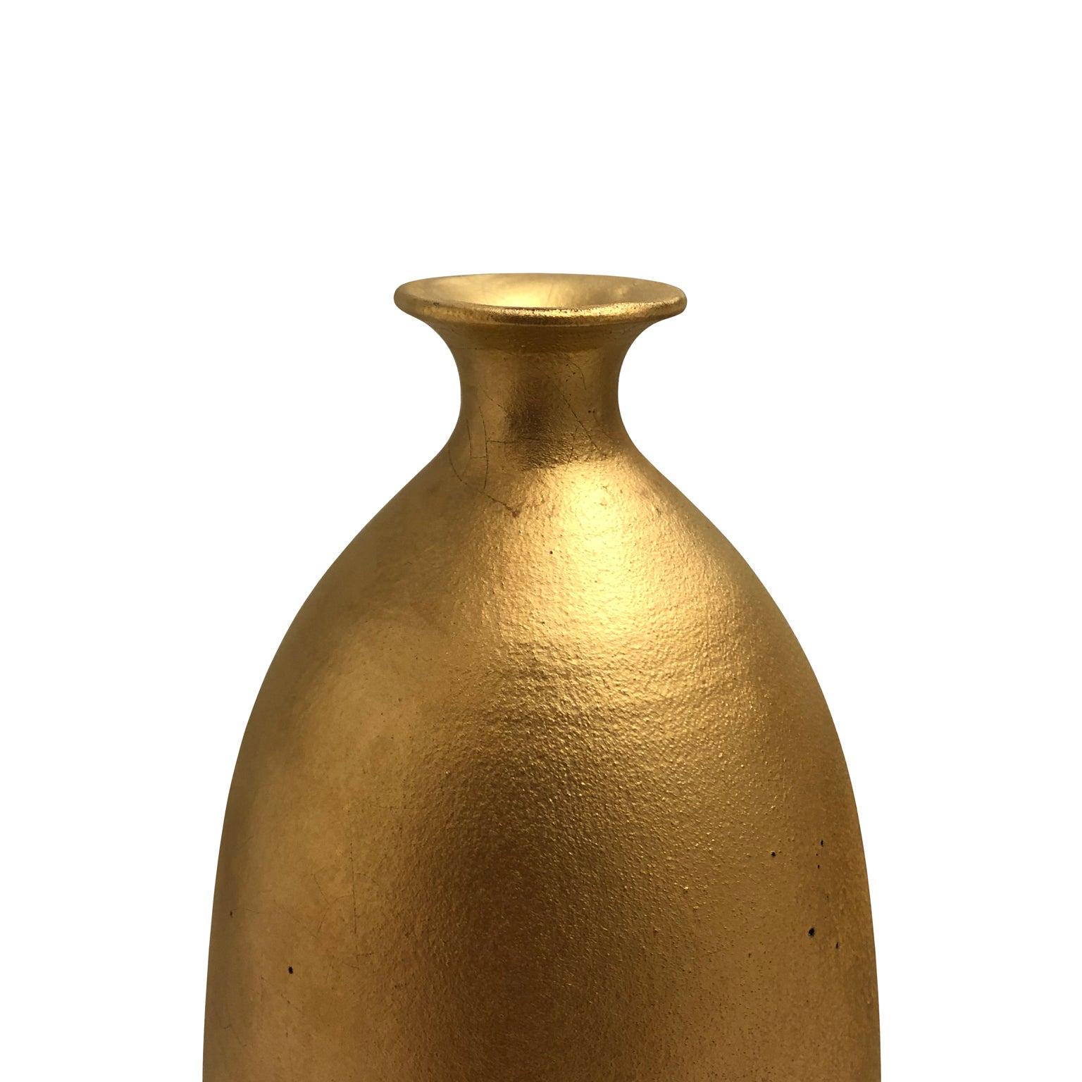 Tall ceramic bottle vase with burnished gold lustre glaze by Sandi Fellman, 2019. Veteran photographer Sandi Fellman's ceramic vessels are an exploration of a new medium. The forms, palettes, and sensuality of her photos can be found within each