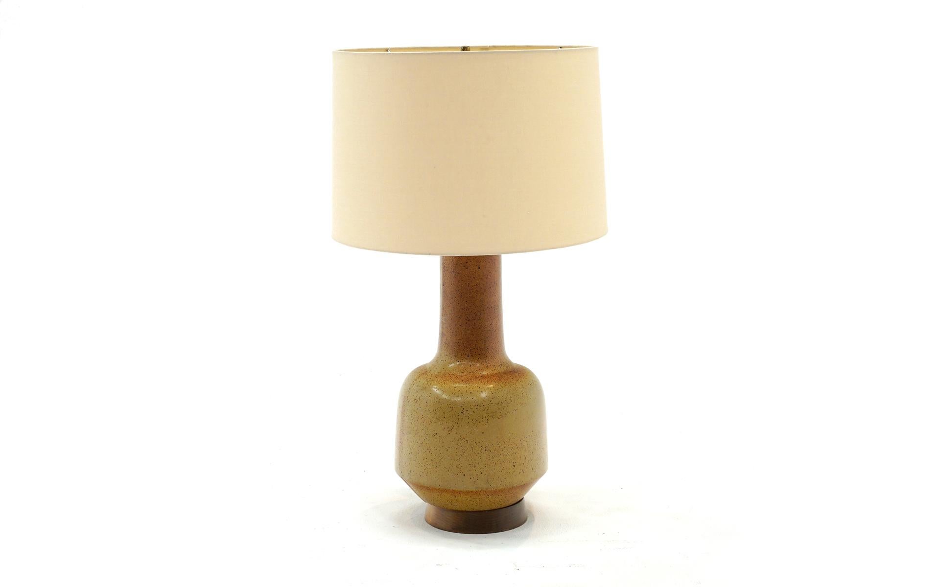 Two tone ceramic table lamp with the original shade much in the style of Martz lamps for Marshall Studios. Maybe an unsigned example? We don't know but appears just as well made and has a beautiful two tone gradient finish. No chips, cracks or