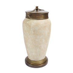Tall ceramic urn with oxidized brass lid and base, c. 1900's