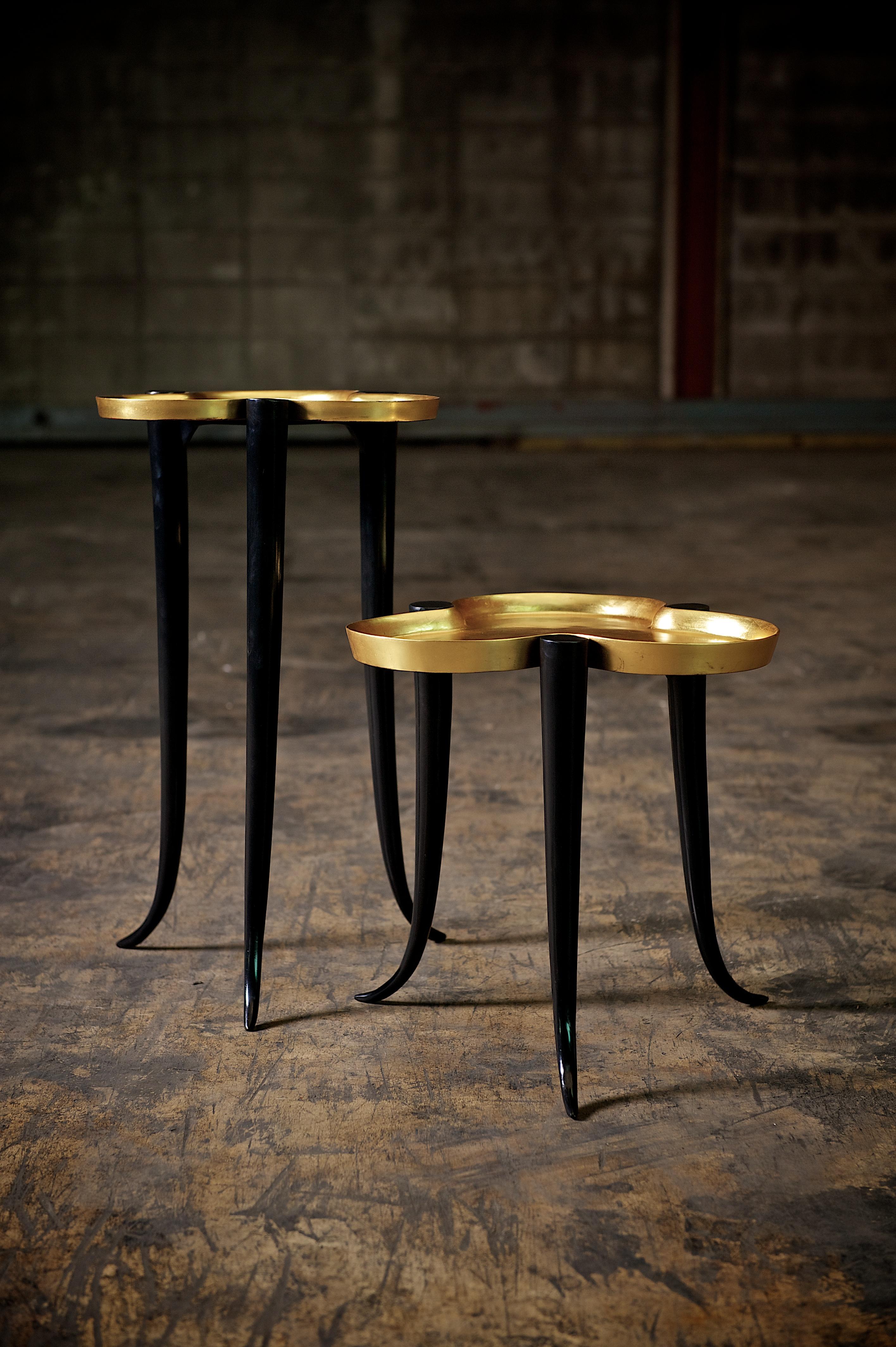 Tall Chime Side Table in Bronze and Silver or Gold Leaf Lacquer by Elan Atelier.

The Chime side table is composed of cast bronze legs with a gilt lacquer trey top. The Chime is available with either a silver leaf or gold leaf lacquer top. Custom
