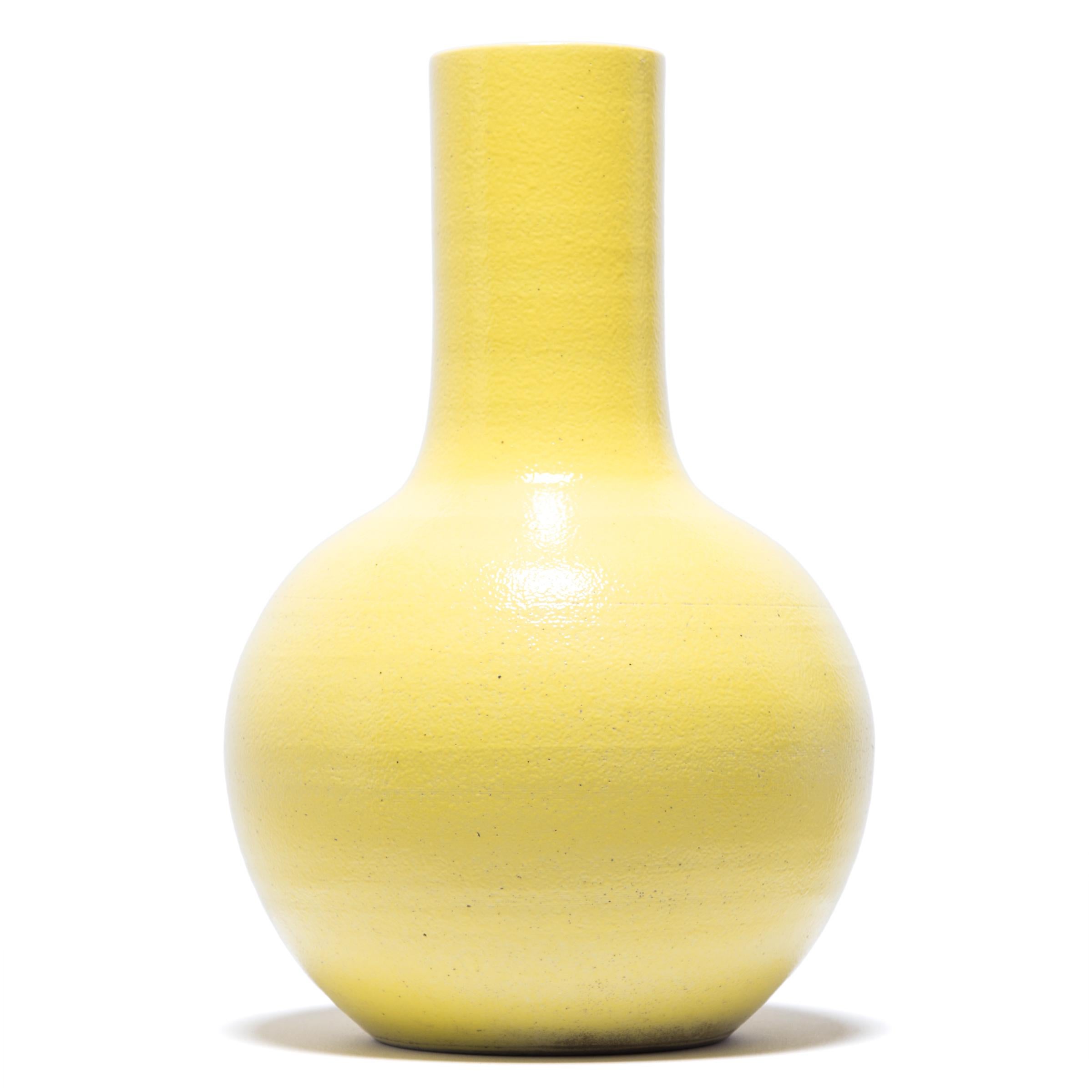 This statement gooseneck vase was made by a skilled artisan, knowledgeable in the ancient techniques of glazing which made Chinese ceramics world renowned. The tall gooseneck design was sought after by 19th century European collectors who bought