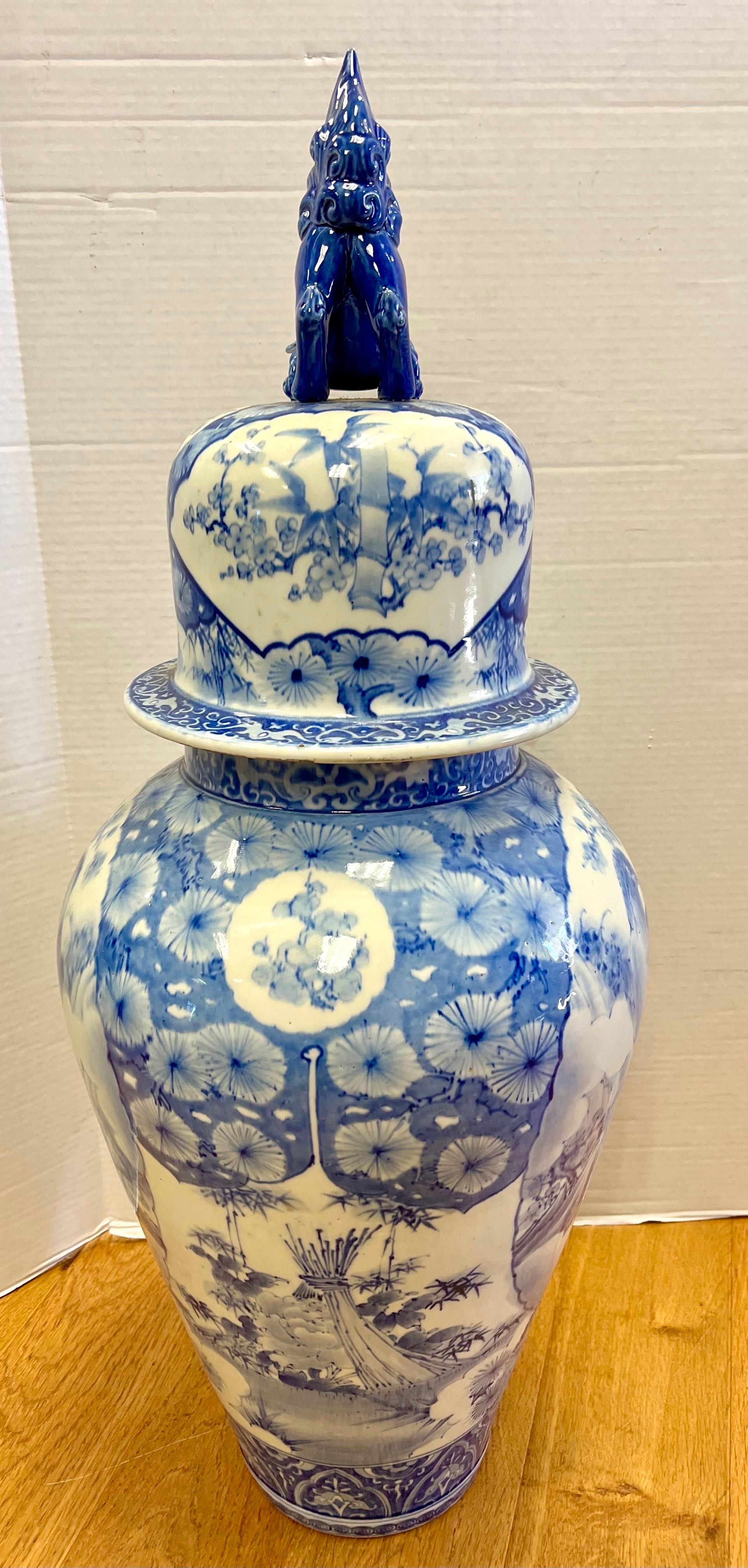 20th Century Tall Chinoiserie Blue and White Ginger Jar Urn with Foo Dog For Sale