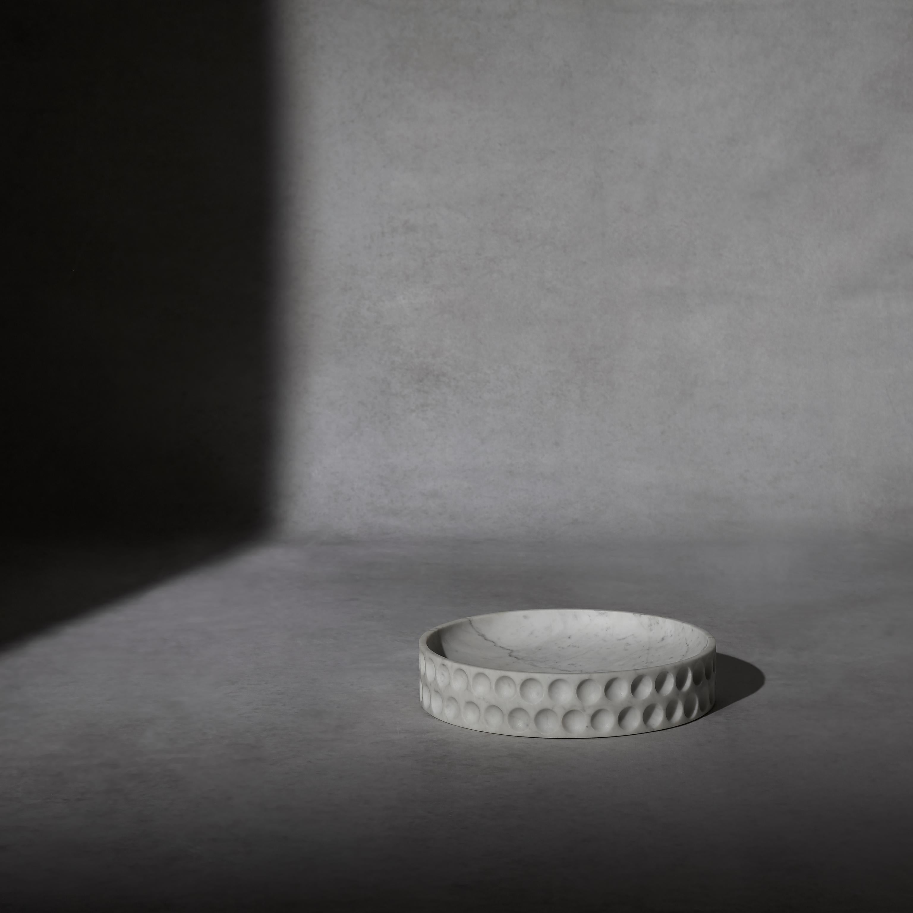 The Mirage collection is an exploration of where shape and function coincide, creating an element without frills. By subtracting materials and exploring the shadows in the negative, studiointervallo has originated a series of simplistic yet