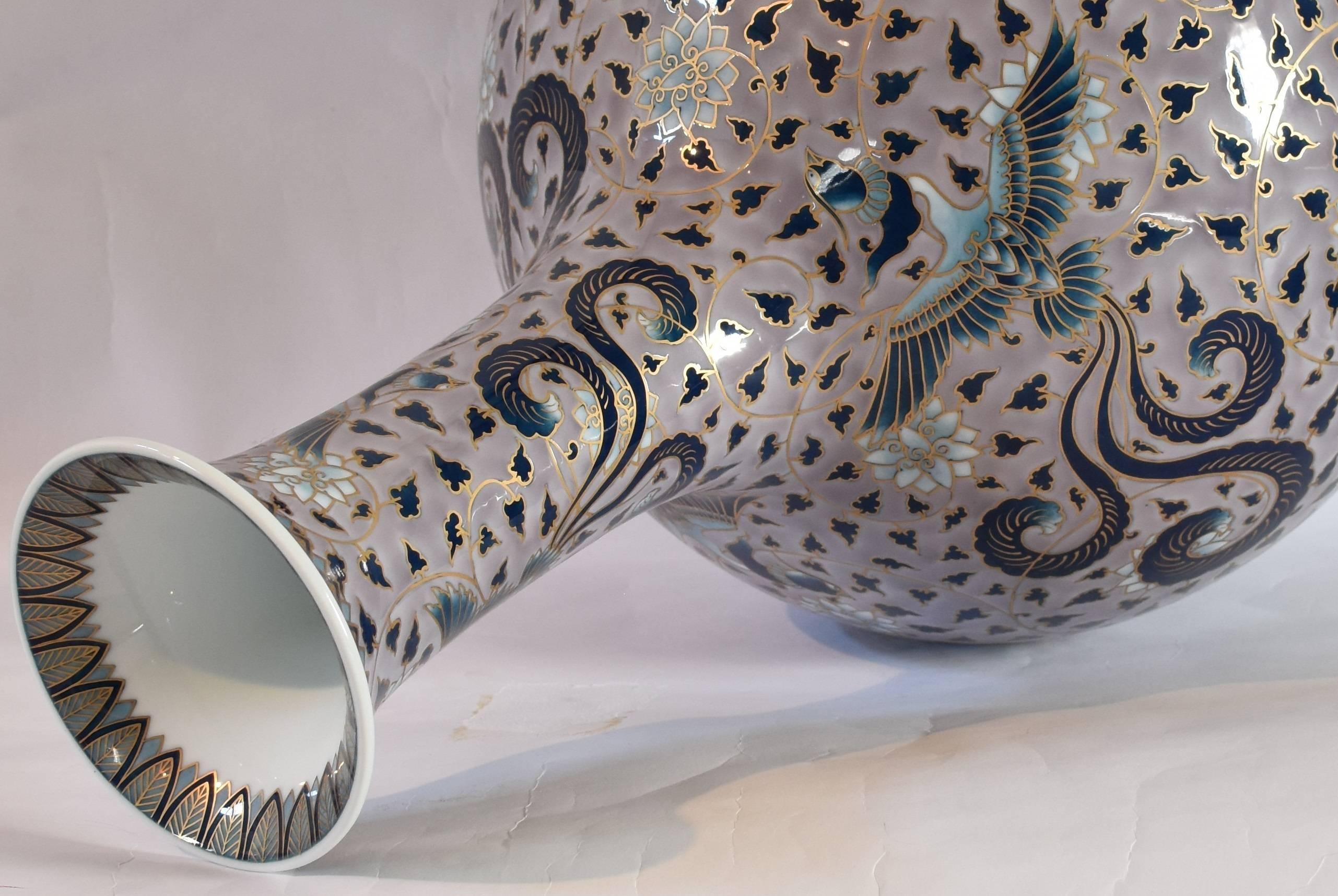 Extraordinary massive contemporary Japanese porcelain vase, extremely intricately gilded and hand-painted on fine Arita porcelain in a stunning shape in purple-grey, a signed masterpiece by highly acclaimed and award-winning master ceramic artist in