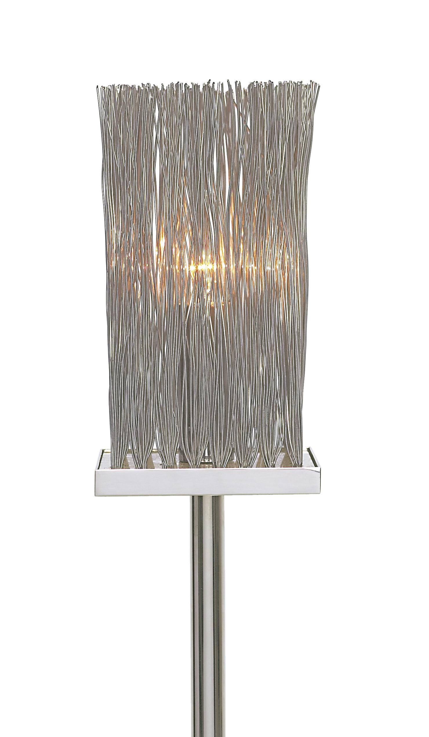 Tall Contemporary Modern Italian Wire Chrome Floor Lamp with chrome base. the chrome base is a heavy chrome piece that provides weight for stability. This chrome floor lamp has a wired top that is attractive and allows light to flow through. 