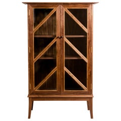 Tall Contemporary Walnut Cabinet with Glass Doors and Butternut Details