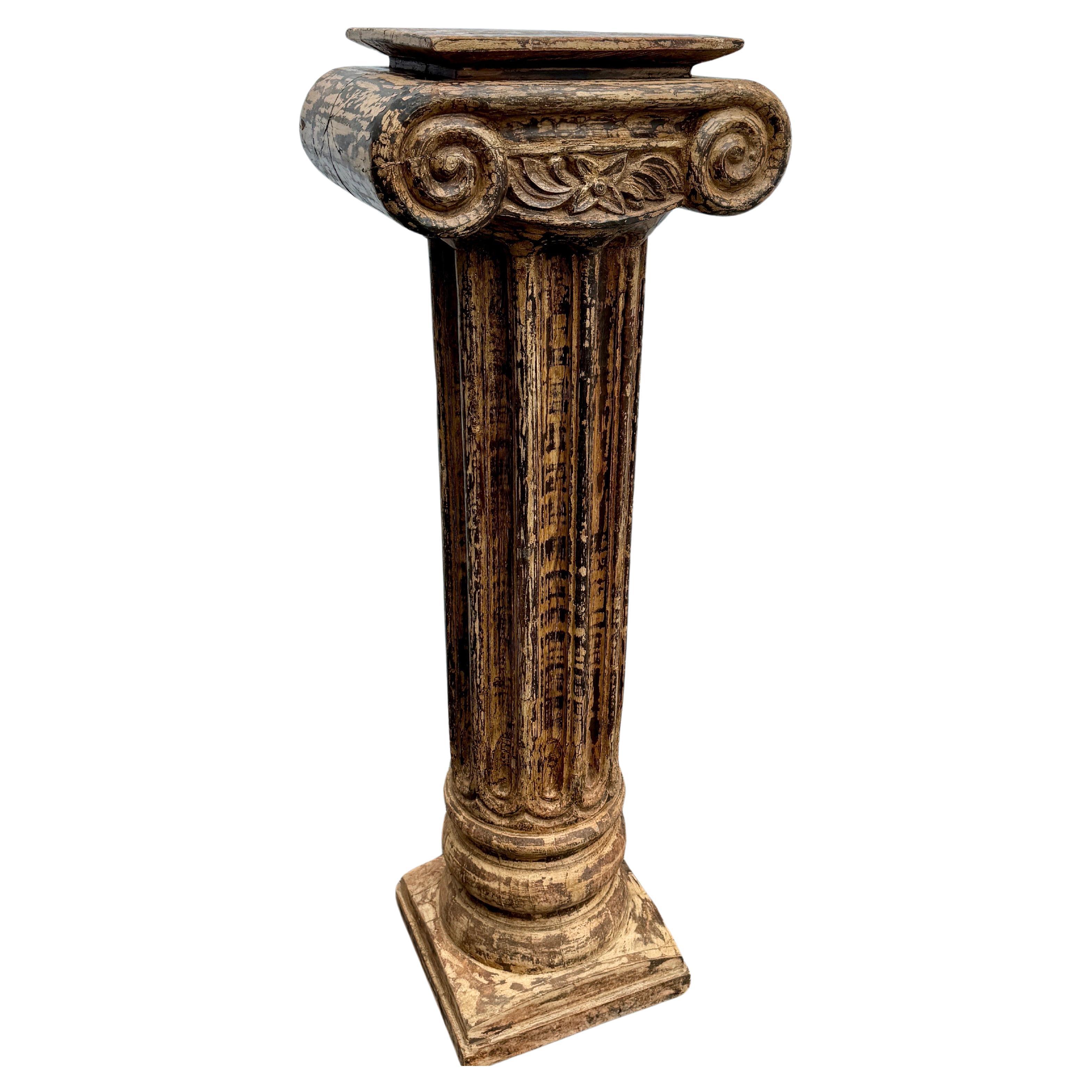 Bring a touch of classical architecture into your home with this impressive Corinthian Column Pedestal. This classic column style stand features wood on all sides. Certainly makes a wonderful addition to any home seeking a display piece in an