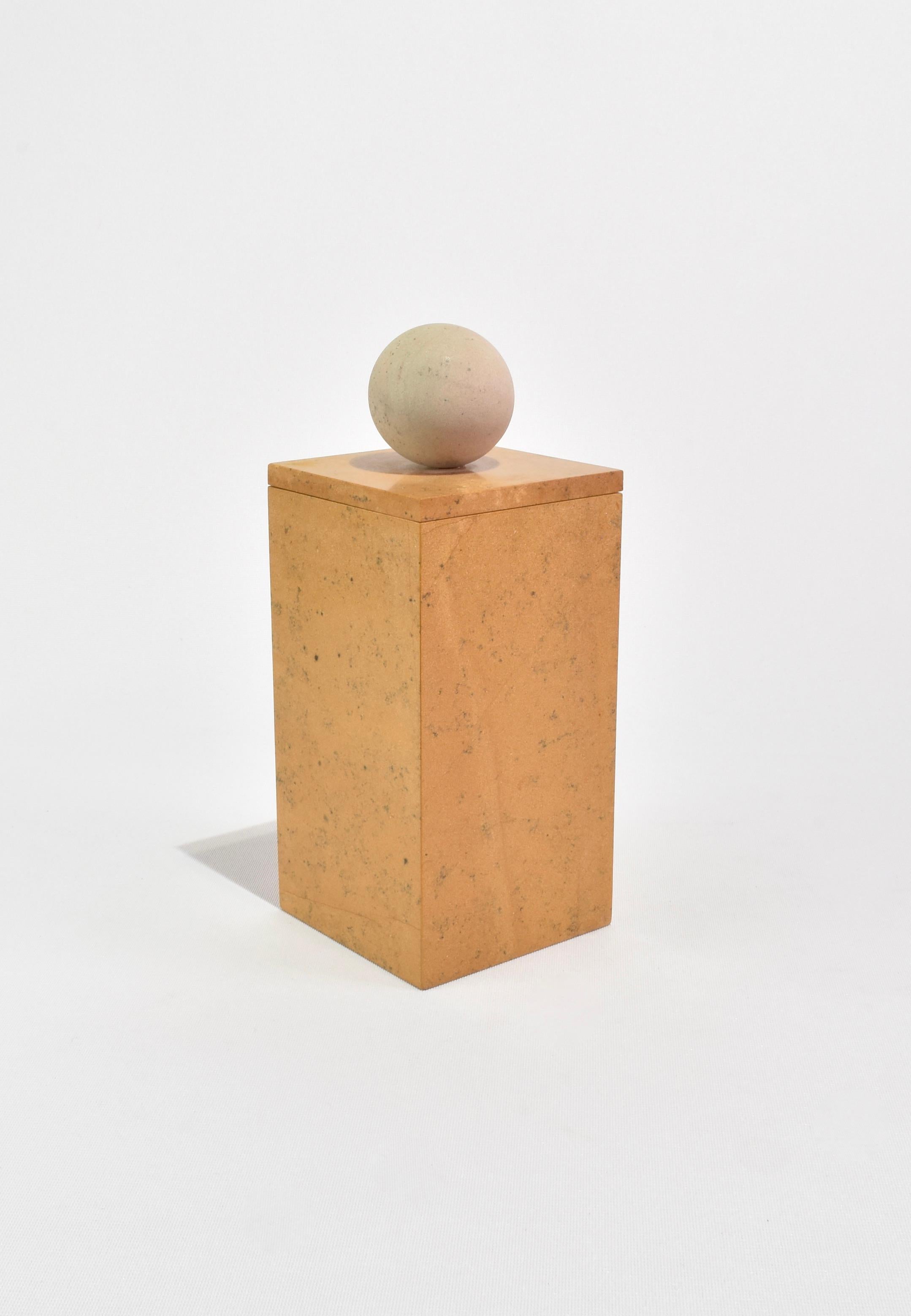 Tall Curio Box by Casa Shop in Yellow Jaisalmer with Beige Sandstone. Inspired by a favorite vintage find, each box features a polished rectangular base with a sphere handle. Handmade by artisans in India.

Use it to hide away an array of cherished