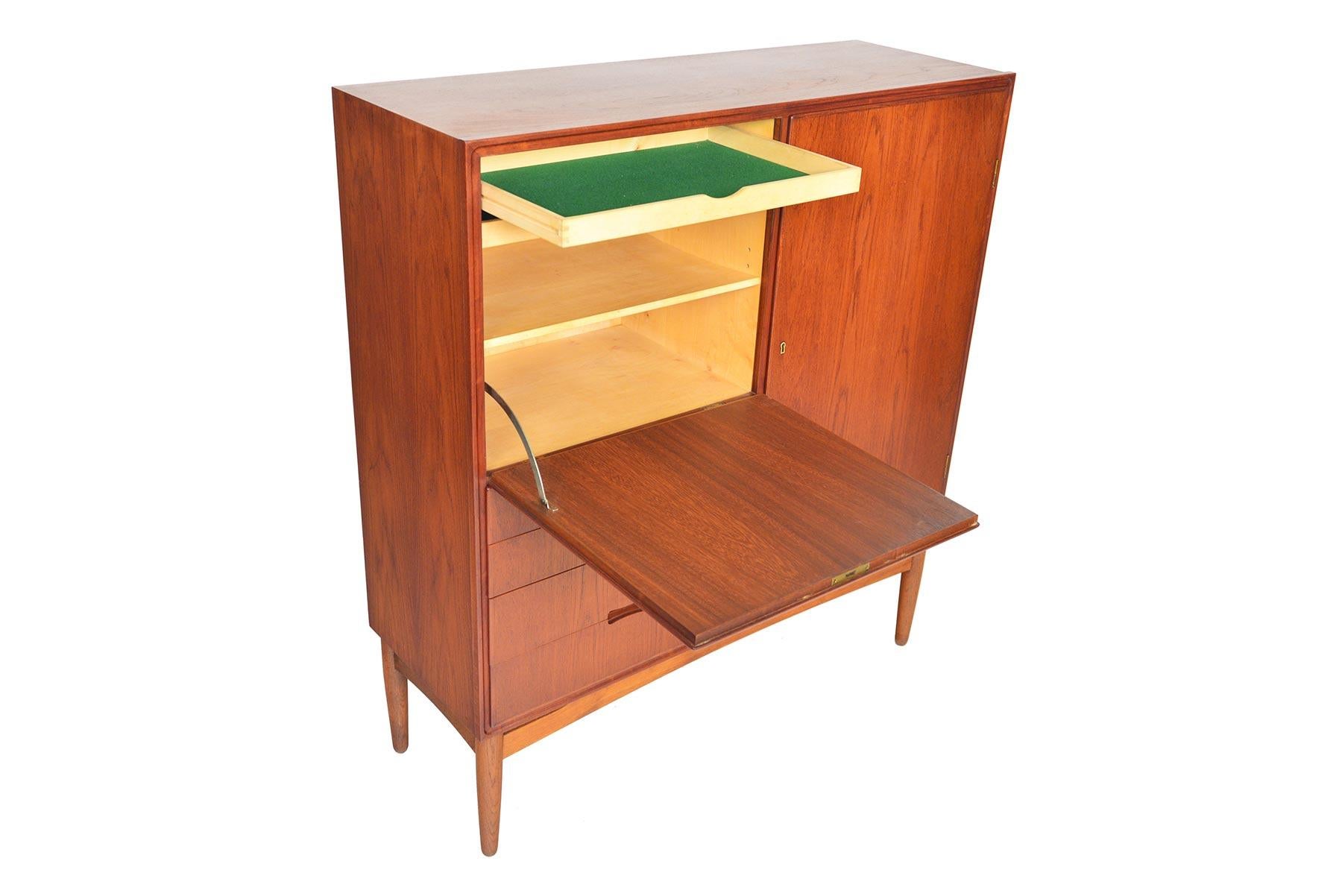 Scandinavian Modern Tall Danish Modern Teak and Oak Cupboard with Bar