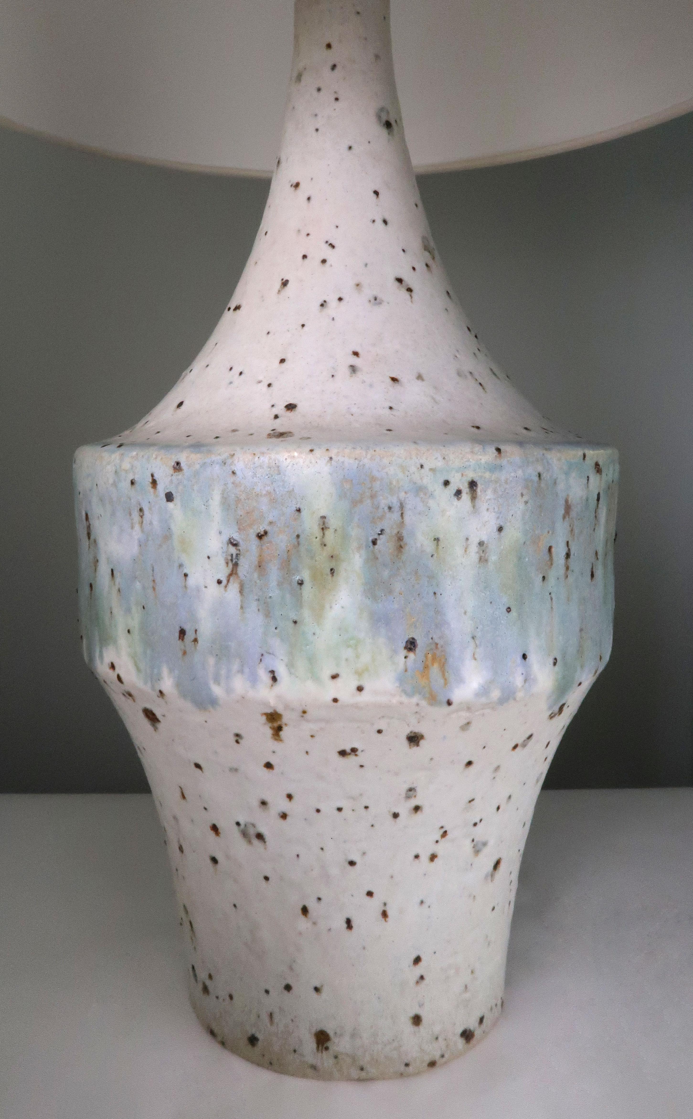 Large Danish Mid-Century Modern handmade and hand decorated ceramic lamp by Sejer Keramik. Manufactured on the Danish island of Funen in the late 1960s-early 1970s. Warm white, light grey spotted glaze with blue, green, golden, brown runny glaze