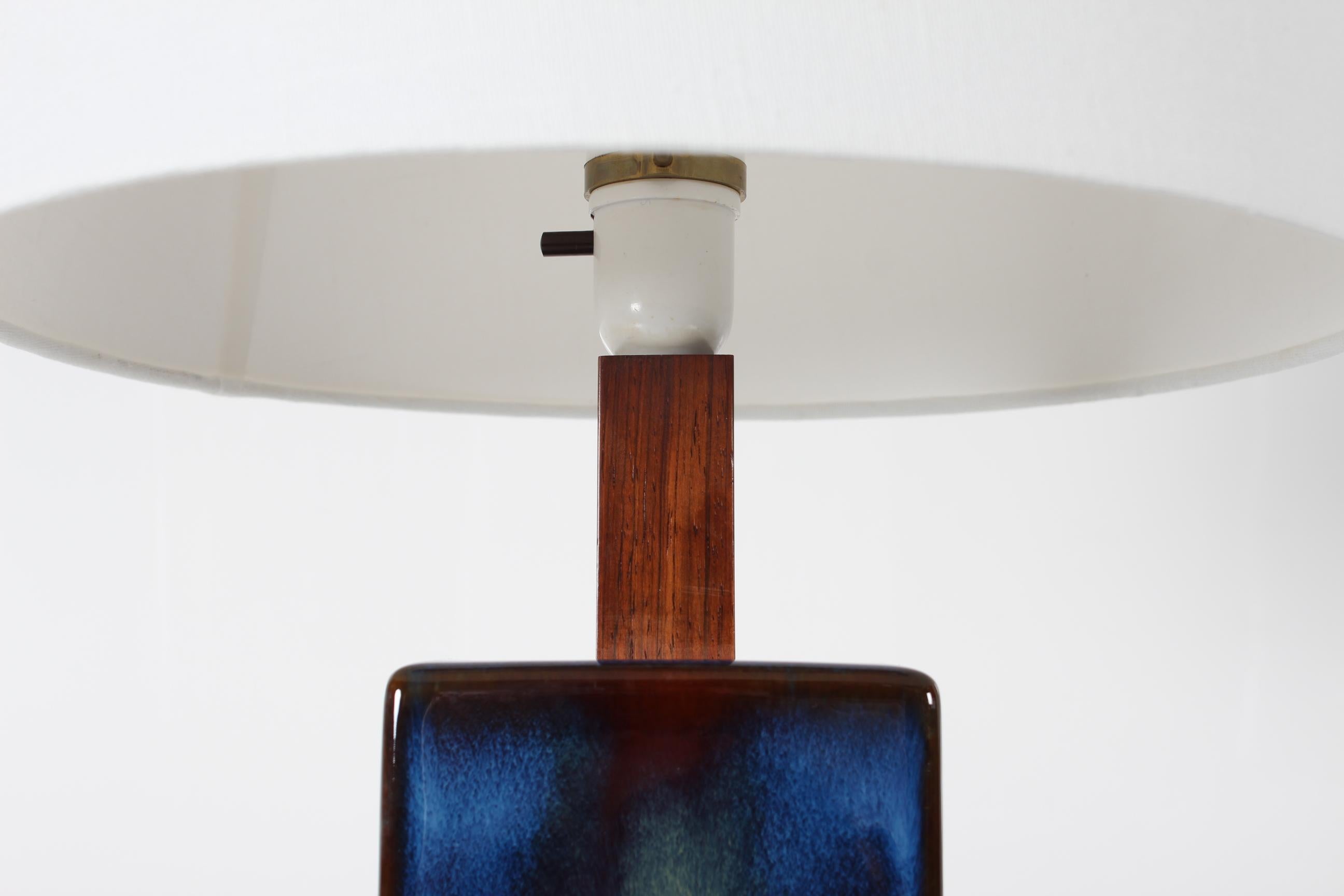 Mid-20th Century Tall Danish Sculptural Table Lamp with Glossy Dark Blue Glaze by Søholm  For Sale