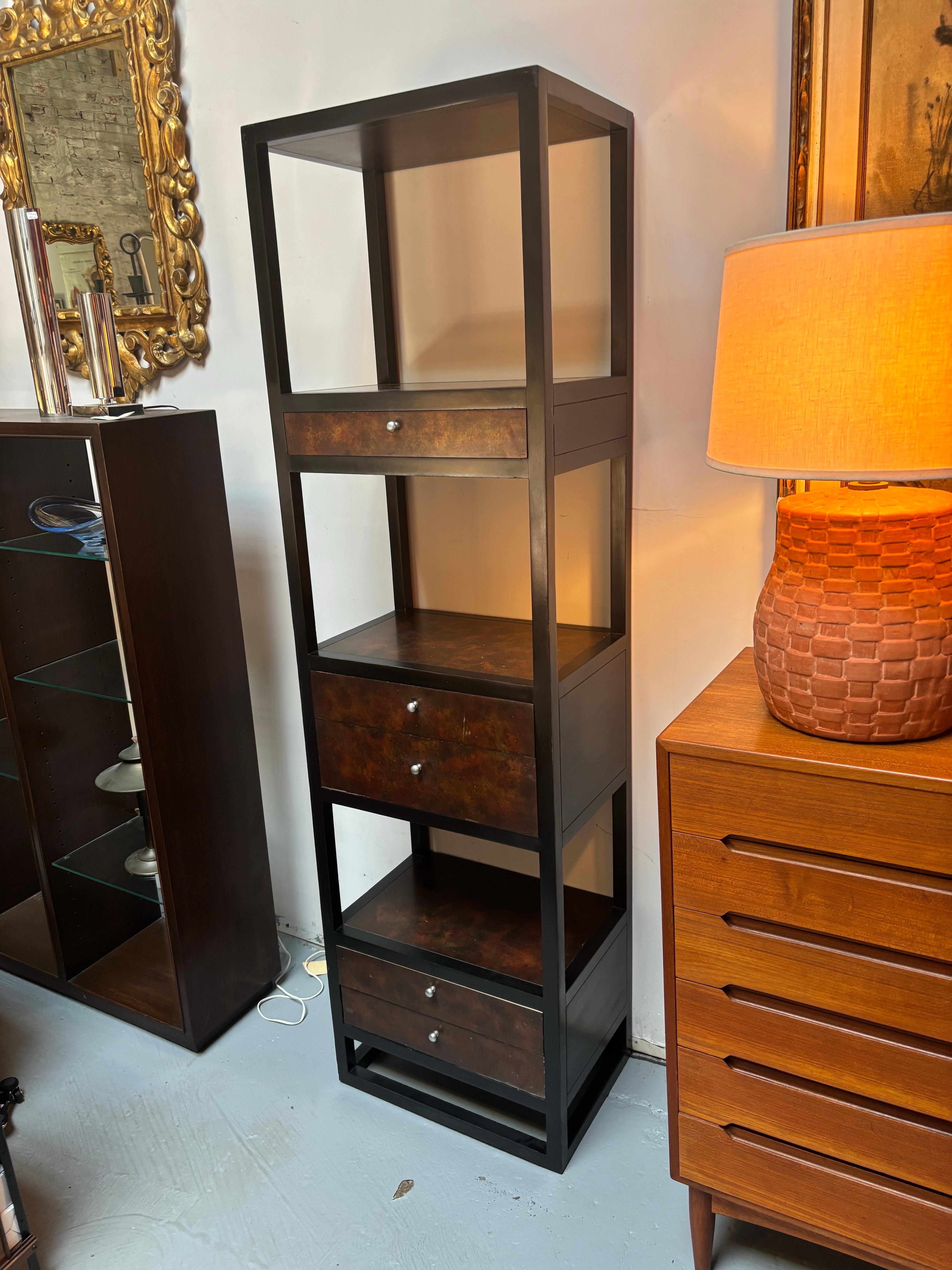 Tall Cabinet perfect to use for storage and display!  Drawer fronts and surfaces have a faux finish.  Outer construction is painted black.  Shows signs of use and wear, with paint loss to faux finishes.  But overall presents well and is super useful