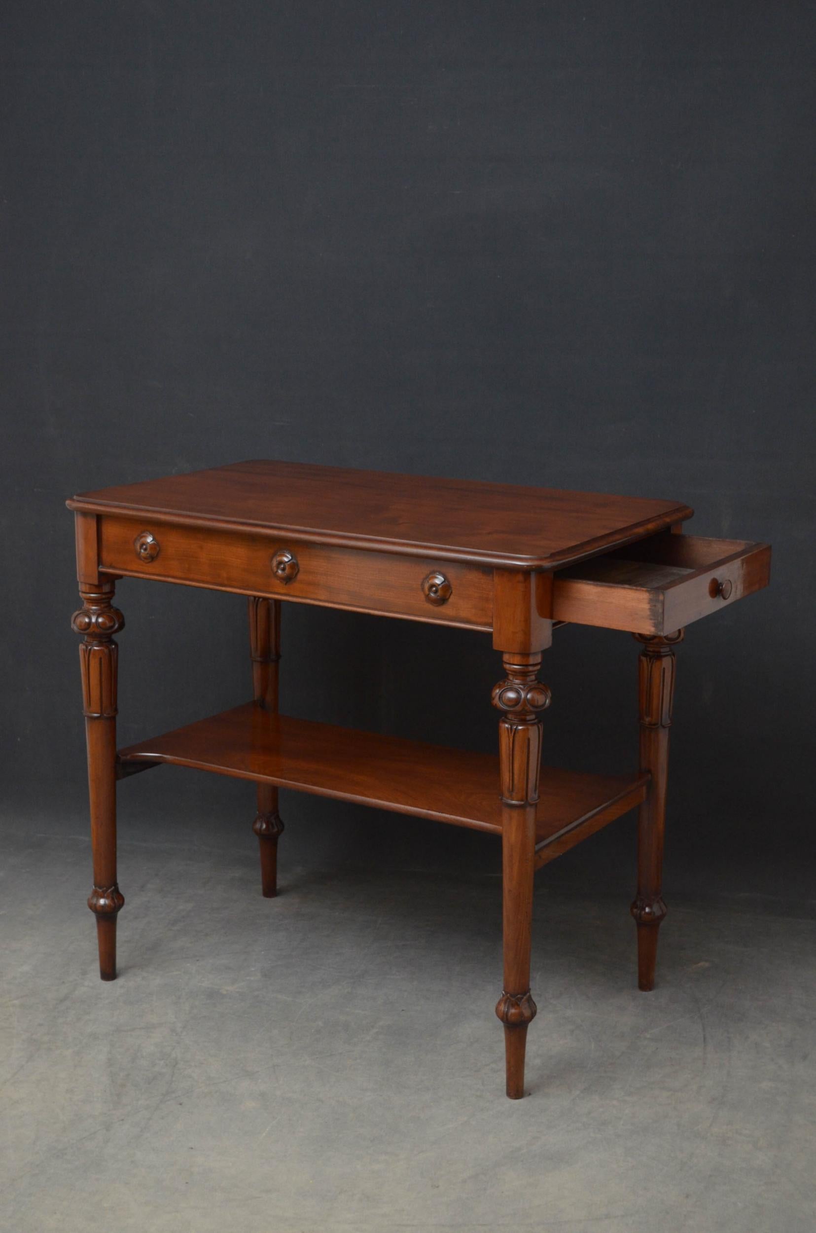 Sn5058, superb quality early Victorian side or console table in mahogany, having figured mahogany top with moulded edge above paterae decorated frieze enclosing a drawer with original turned handle, all standing on turned and tapered tulip carved