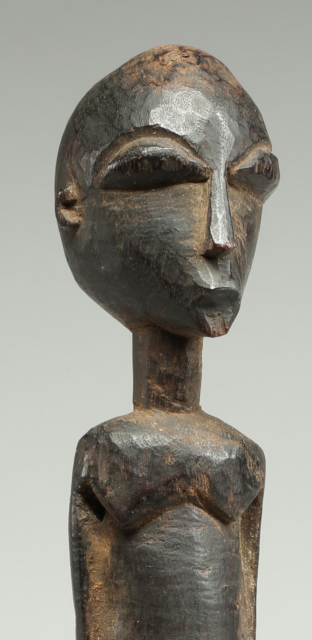 Wood Tall Elegant Standing Lobi Figure with Expressive Face, Early 20th Century Ghana